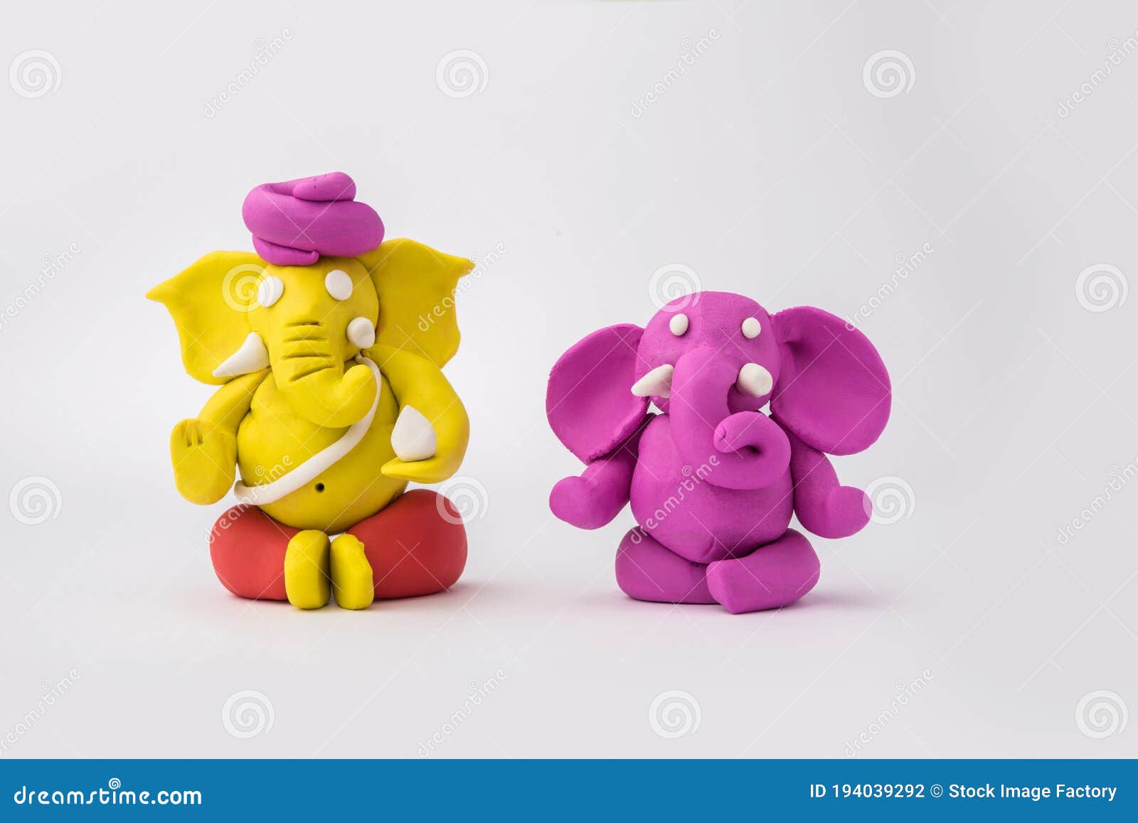 Multicolor Ganesha on wood sitting state/ idol (Small)