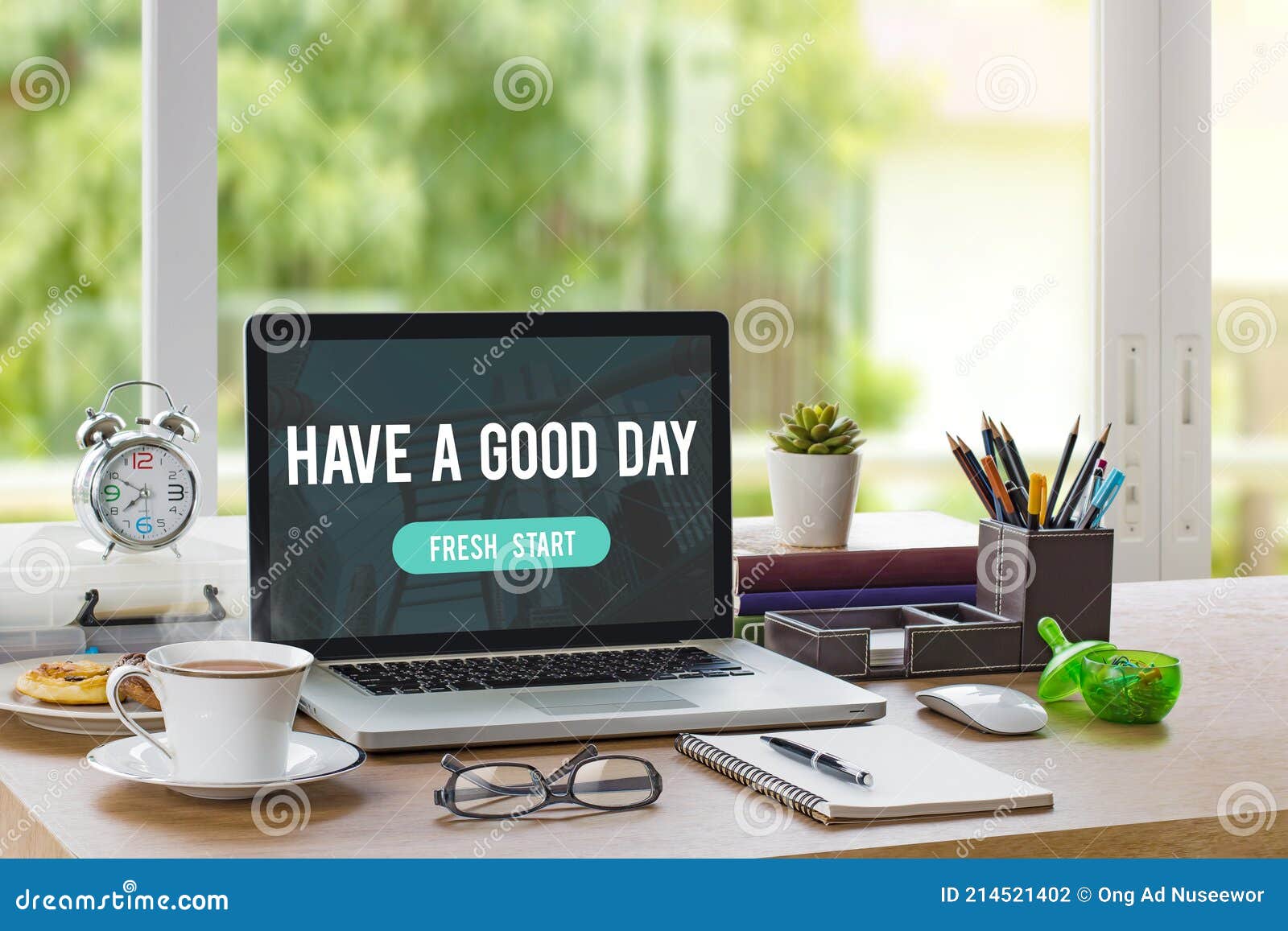 Home Office Workplace with Mockup Laptop, Notebook, Tea Cup, Clock and  Stationery on Wooden Desk in the Morning. Have a Good Day, Stock Photo -  Image of desk, career: 214521402