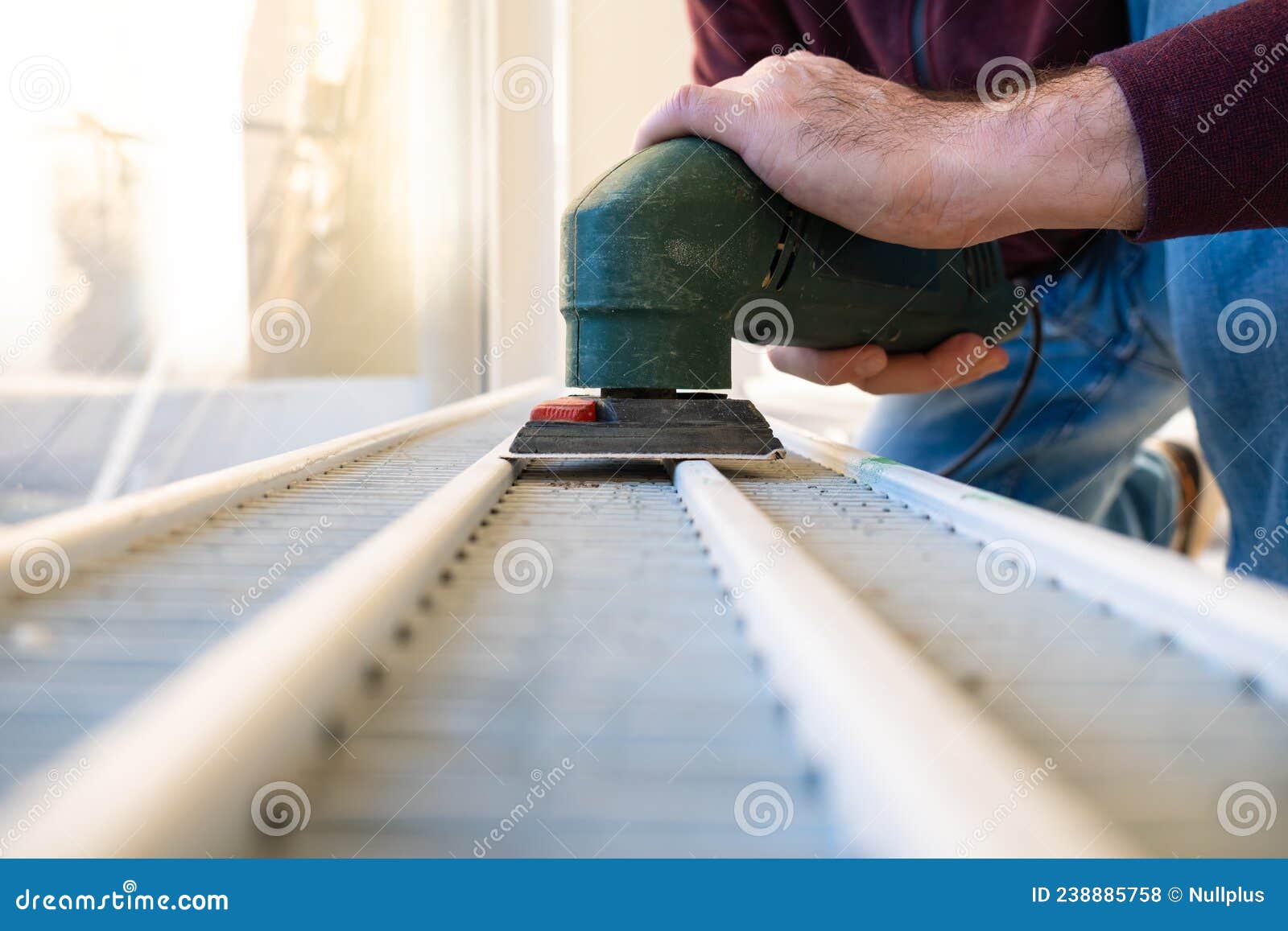 Home Renovation Project, Sanding Old Radiator Stock Photo Image of