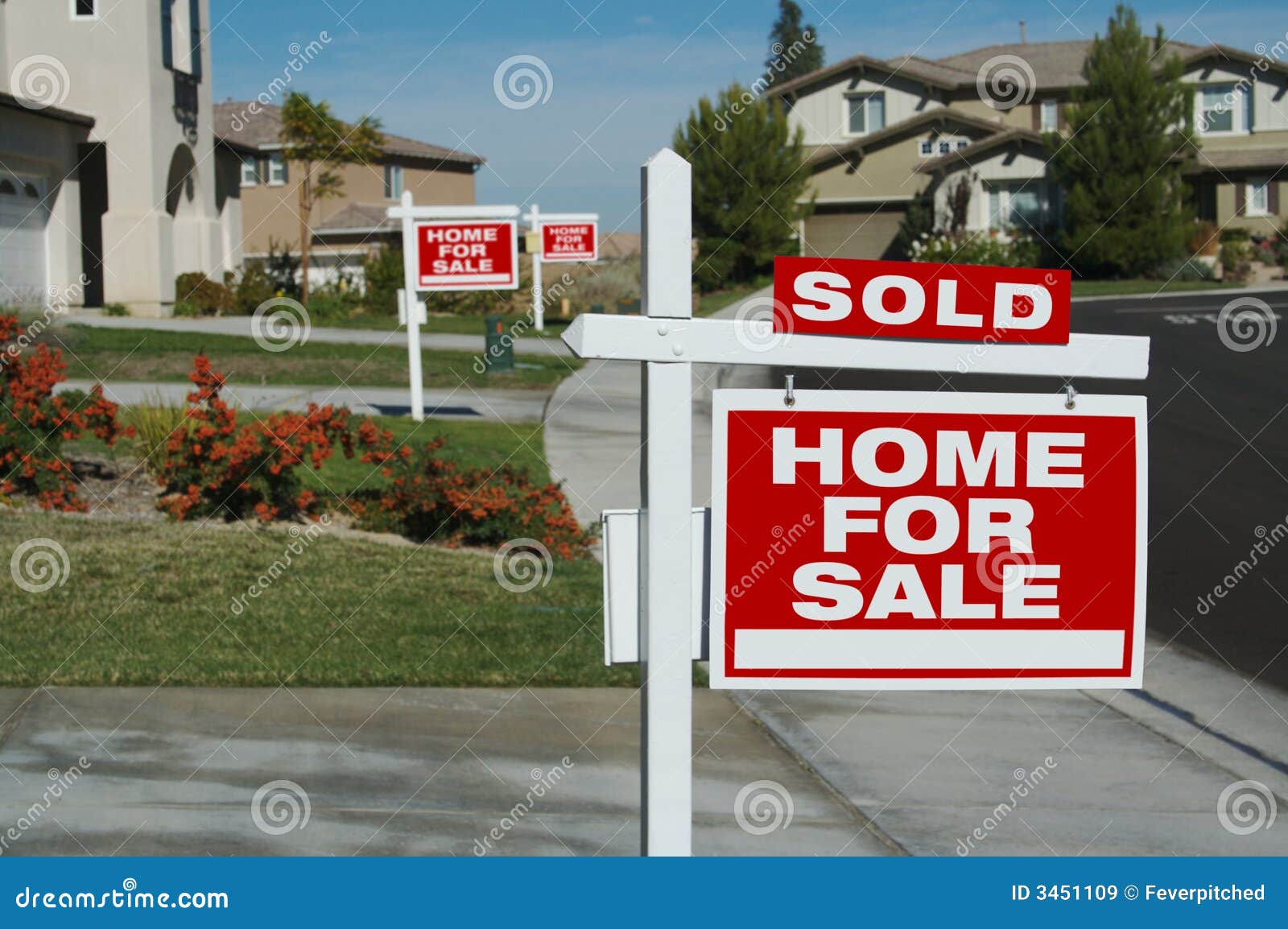 home for sale signs & one sold