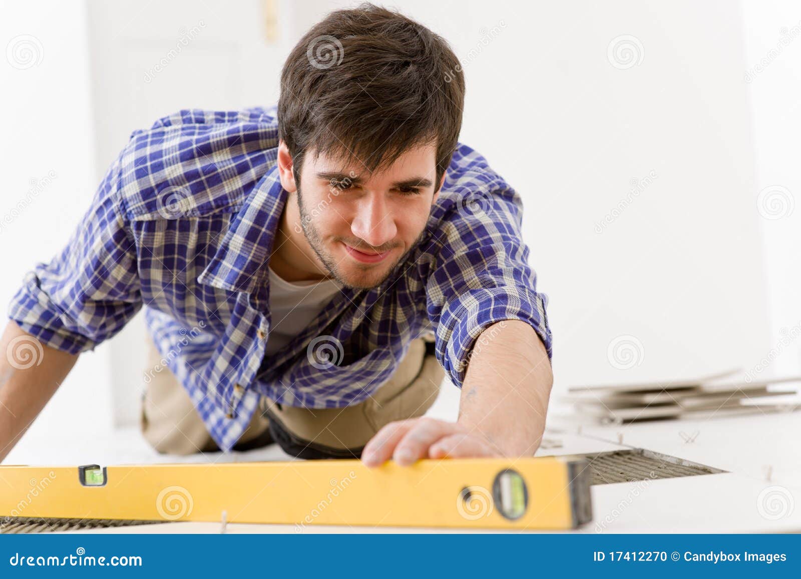 Home Tile Improvement Handyman with Level Stock Photo Image of
