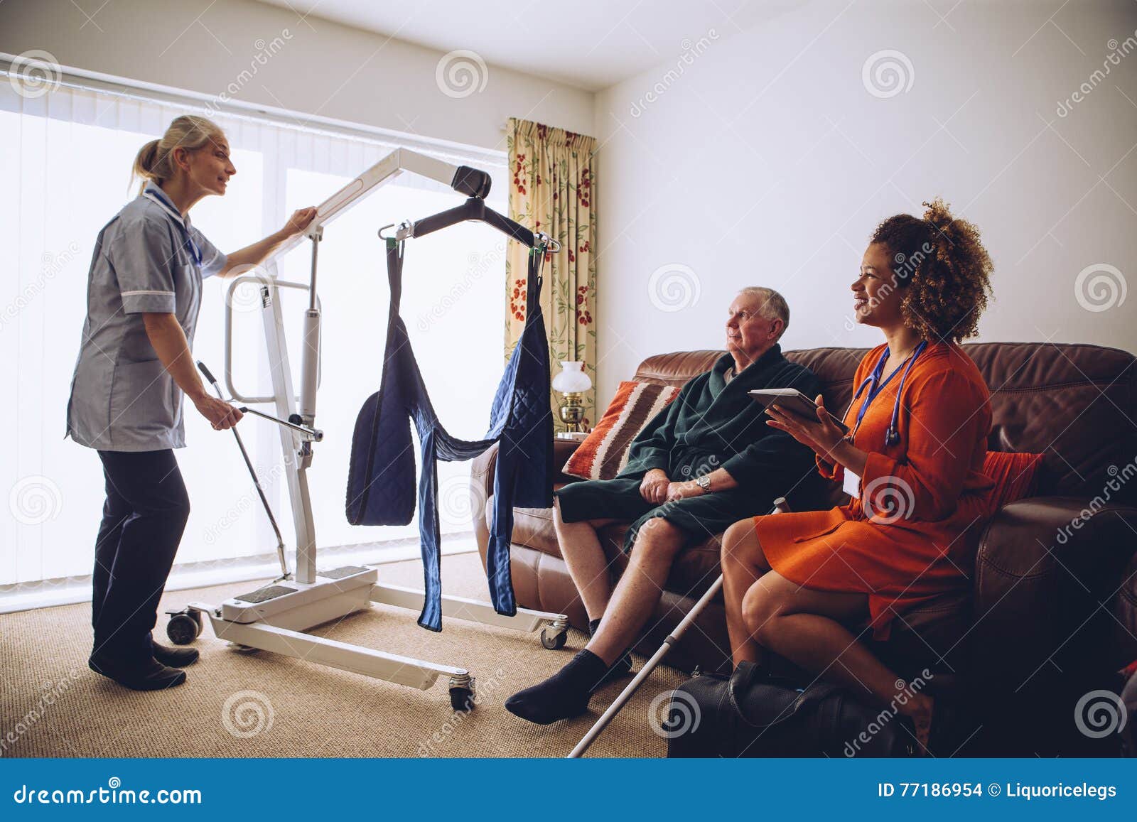 homecare workers preparing hoist