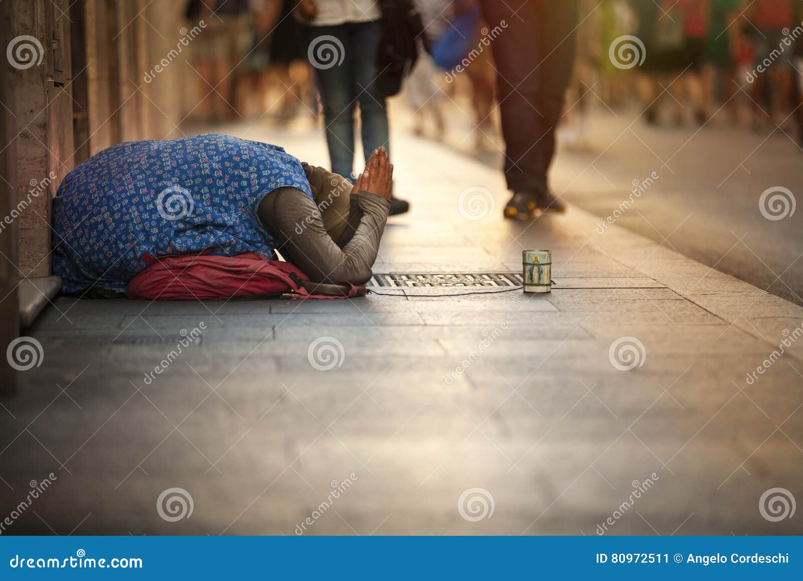 homeless beggar. woman asking for alms. street. rome italy
