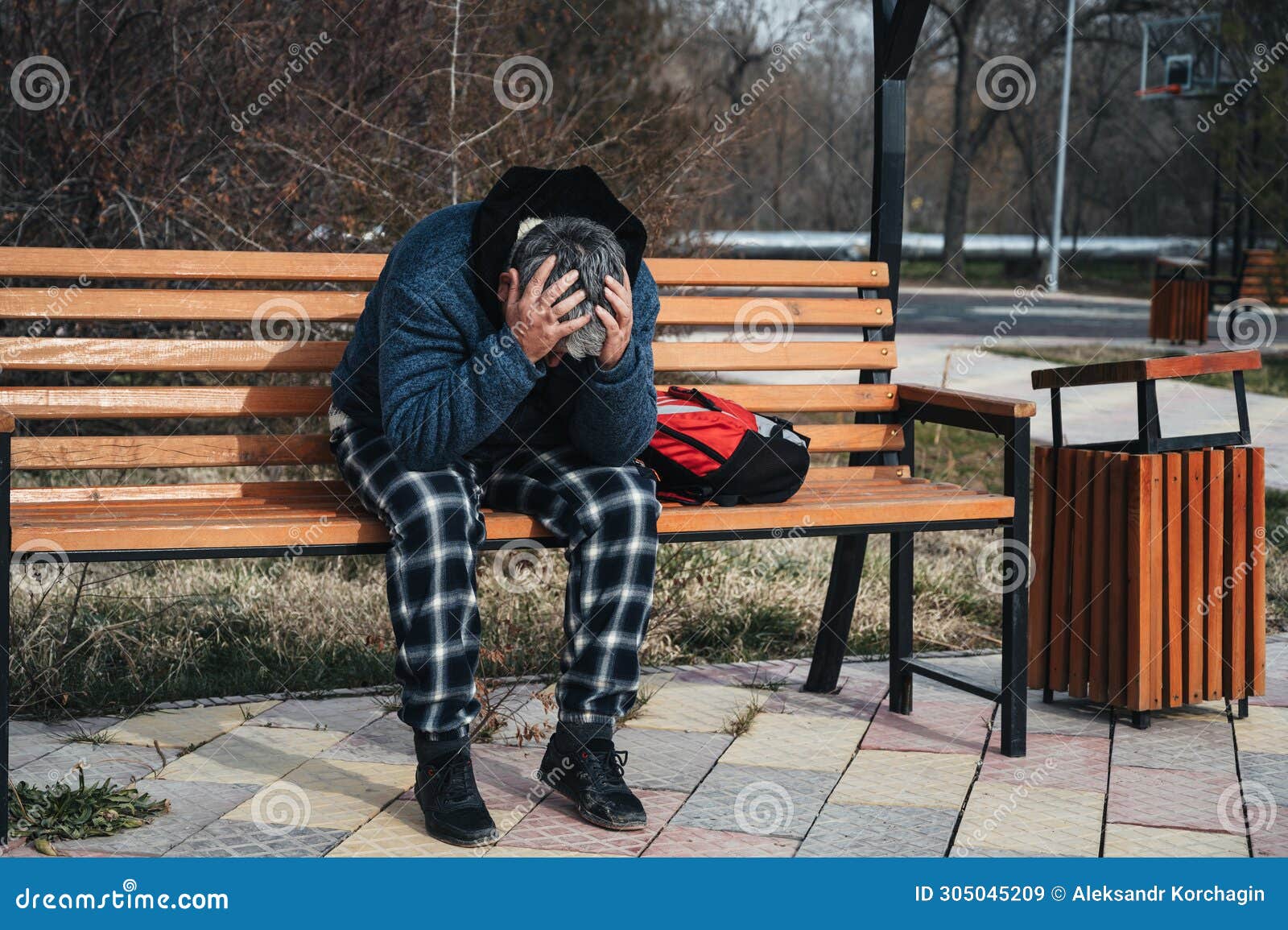Homeless Elderly Old Caucasian Man with Depression Holds Head in Hands ...