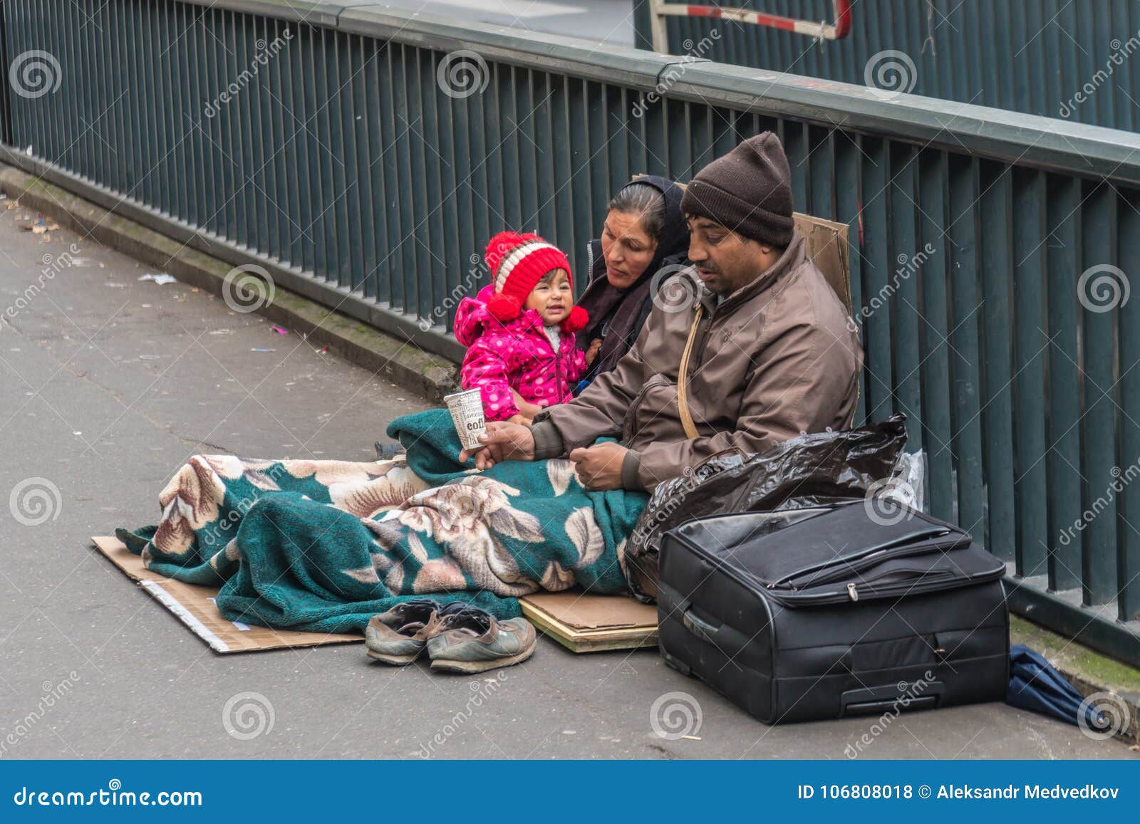 Louis Vuitton wallet filled with cash Stock Photo - Alamy