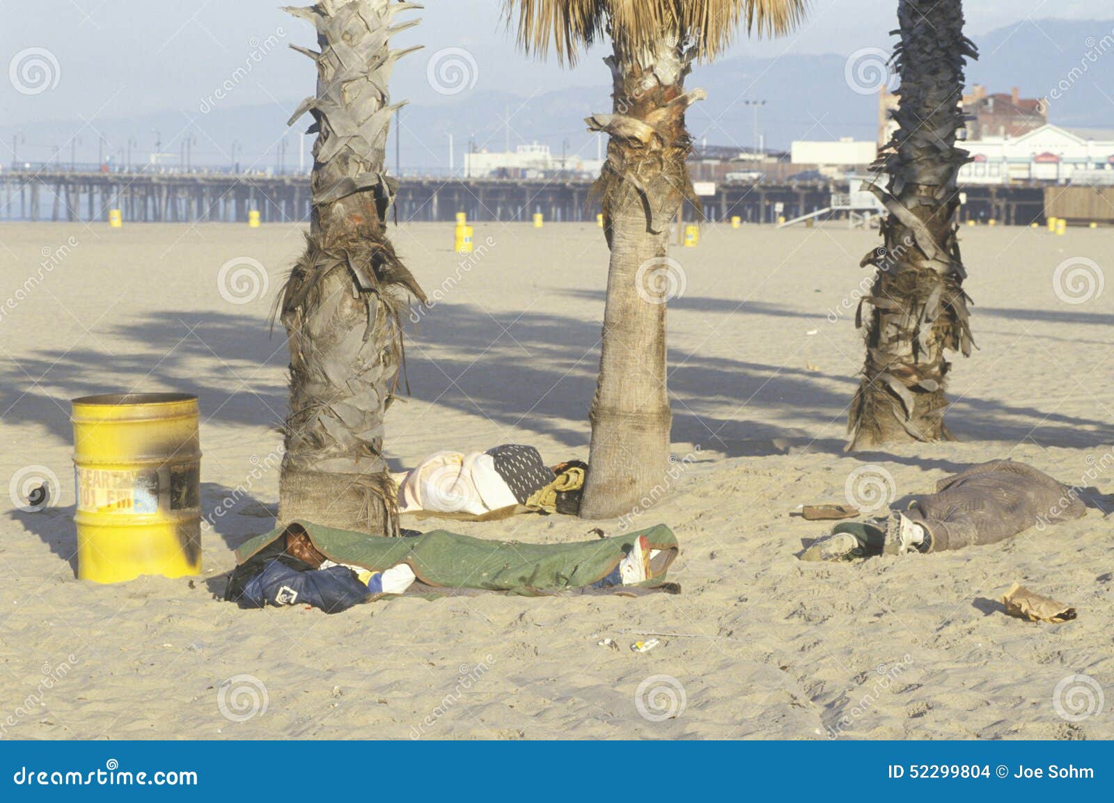 homeless-people-sleeping-venice-beach-california-52299804.jpg