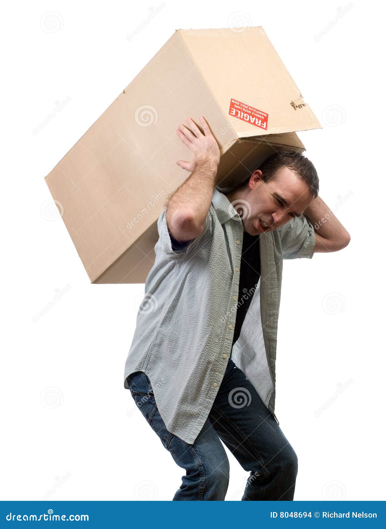 Homem Que Levanta a Caixa Pesada Foto de Stock Imagem de carregar