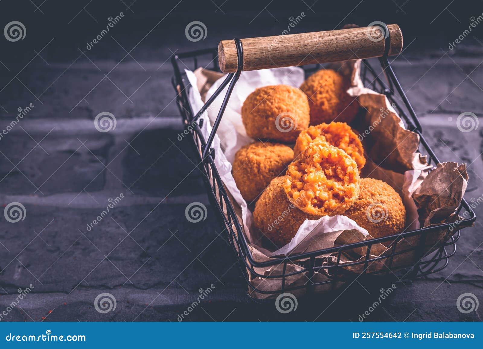 Homemade Arancini Deep Fried Rice Balls Stuffed with Mozzarella