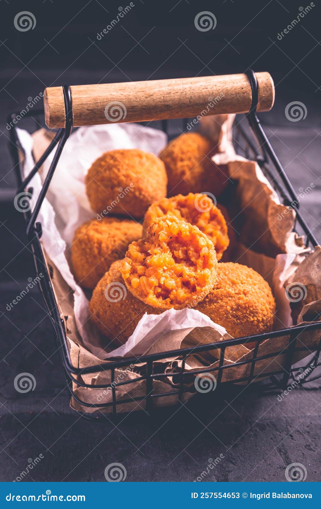 Homemade Arancini - Deep Fried Rice Balls Stuffed with Mozzarella