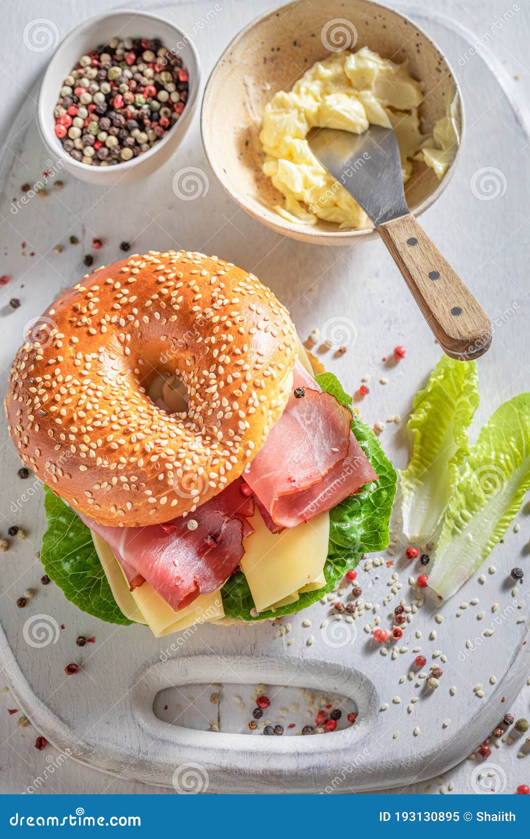 Homemade Bagel with Prosciutto and Cheese for Fresh Breakfast Stock