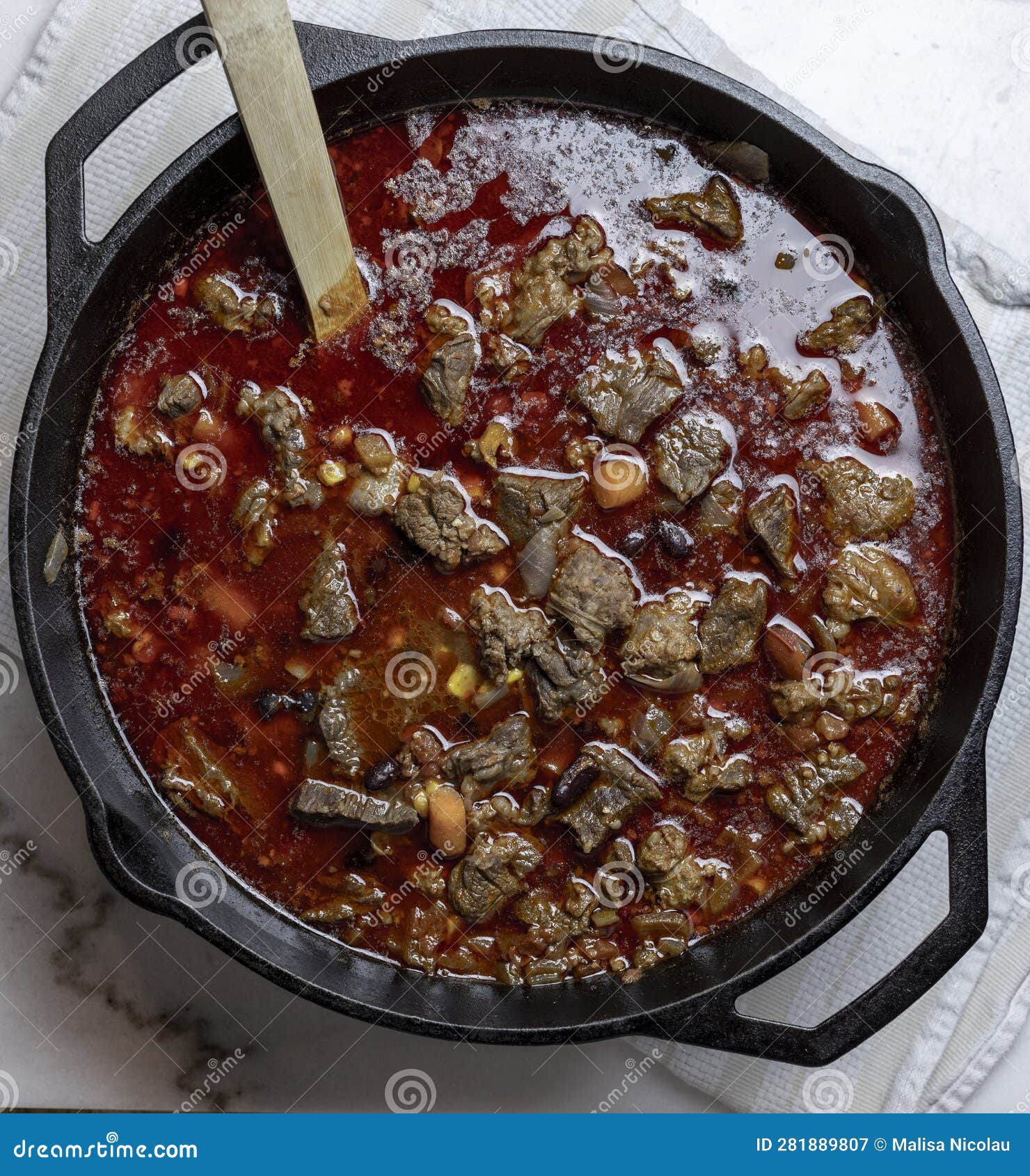 https://thumbs.dreamstime.com/z/homemade-beef-chili-rich-savory-sauce-onions-corn-beans-steak-carrots-cast-iron-pot-tasty-color-made-tomatoes-cooked-281889807.jpg