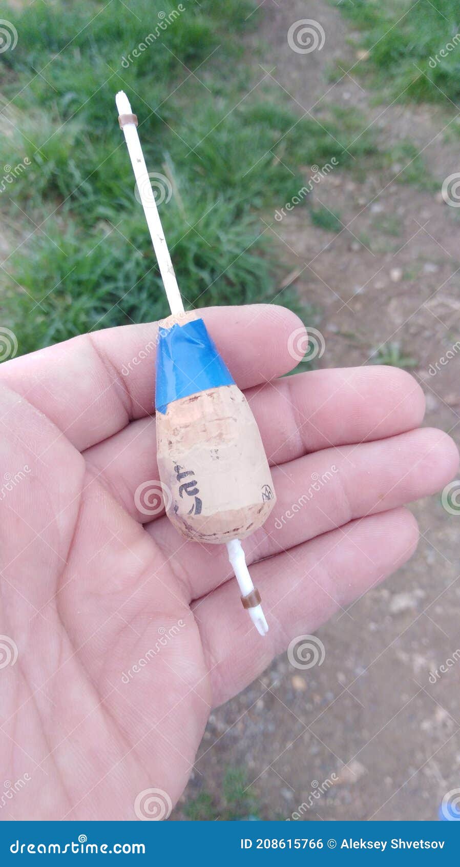 https://thumbs.dreamstime.com/z/homemade-bobber-made-wine-cork-chupa-chups-stick-insulating-tape-fishing-homemade-bobber-208615766.jpg