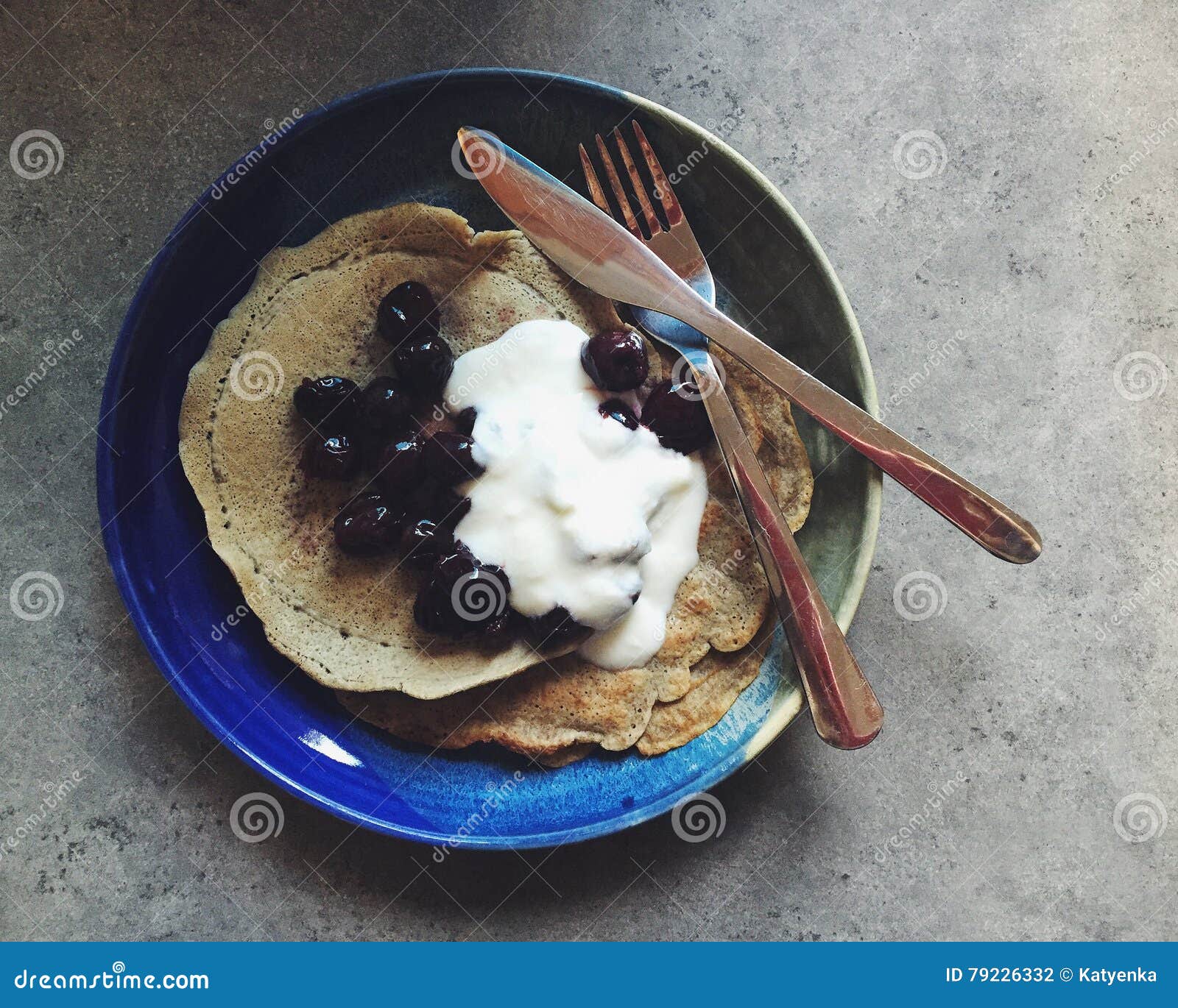 Homemade Buckwheat Pancakes With Cherries And Yogurt Stock Photo
