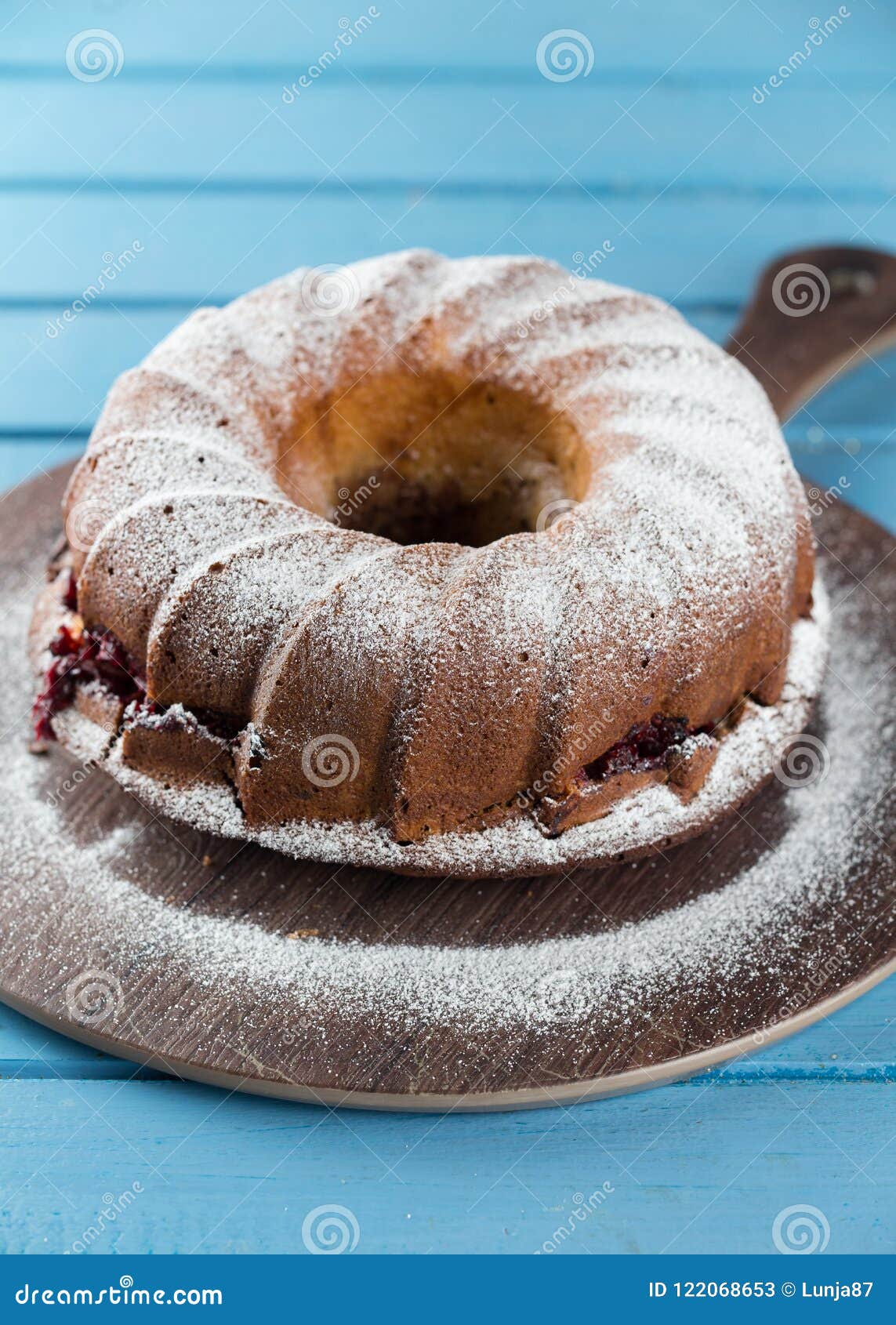 Bundt Cake with Icing Sugar Stock Image Image of pouring, bread
