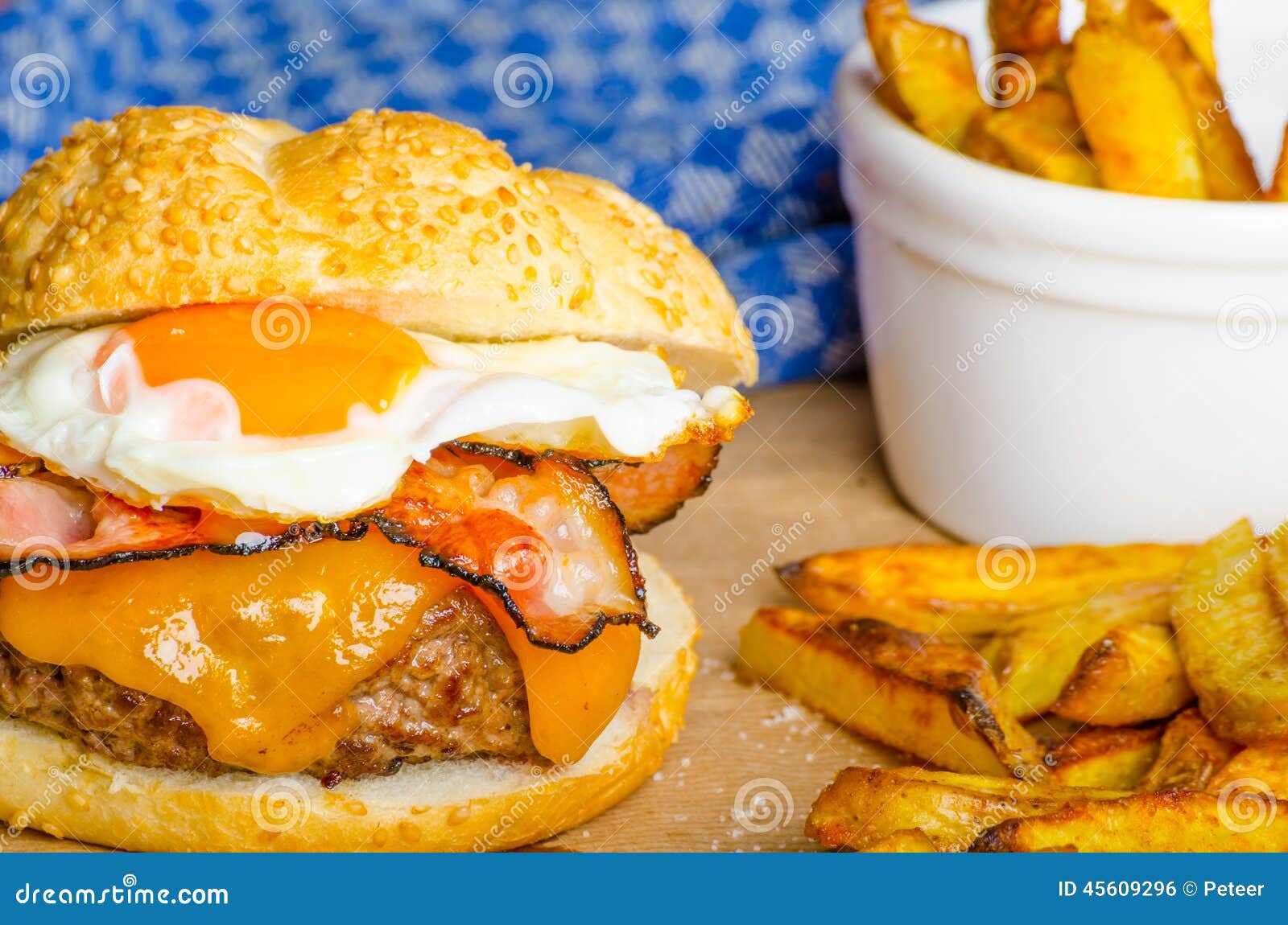 Homemade Burger with Fried Egg and Spicy Fries Stock Photo - Image of ...