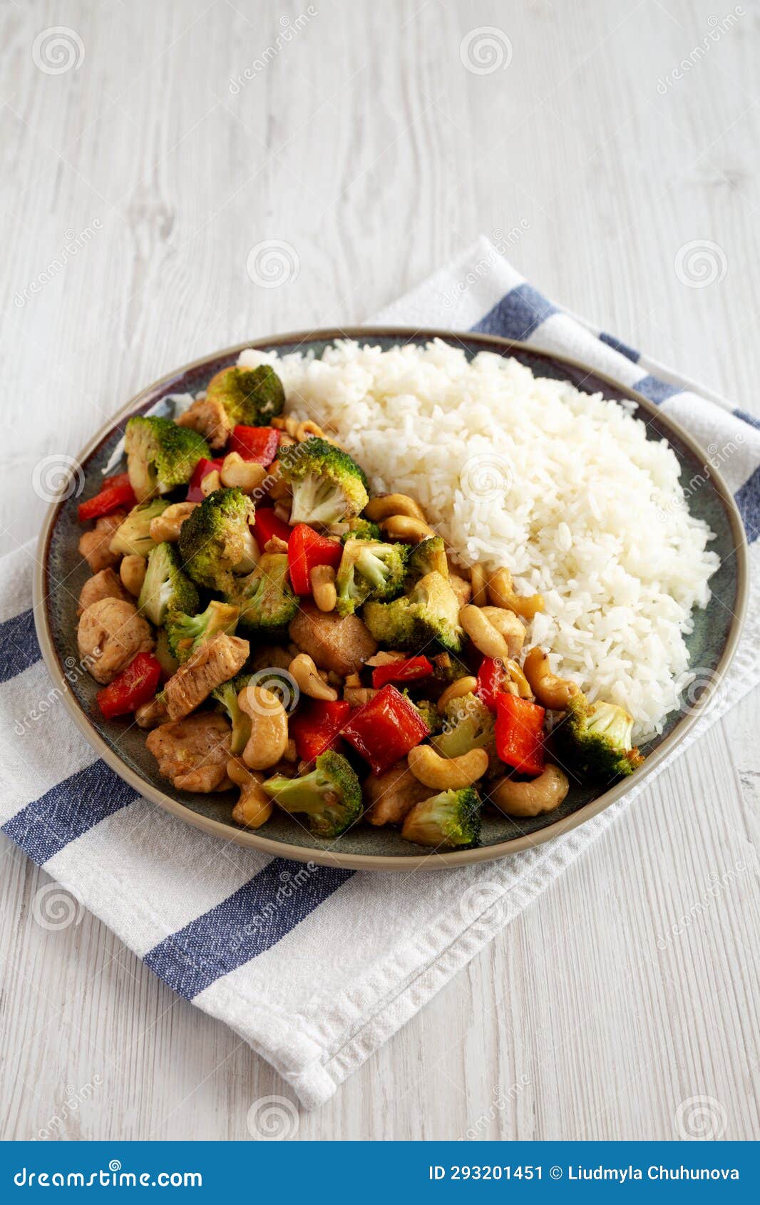Homemade Cashew Chicken Stir-Fry on a Plate, Side View Stock Image