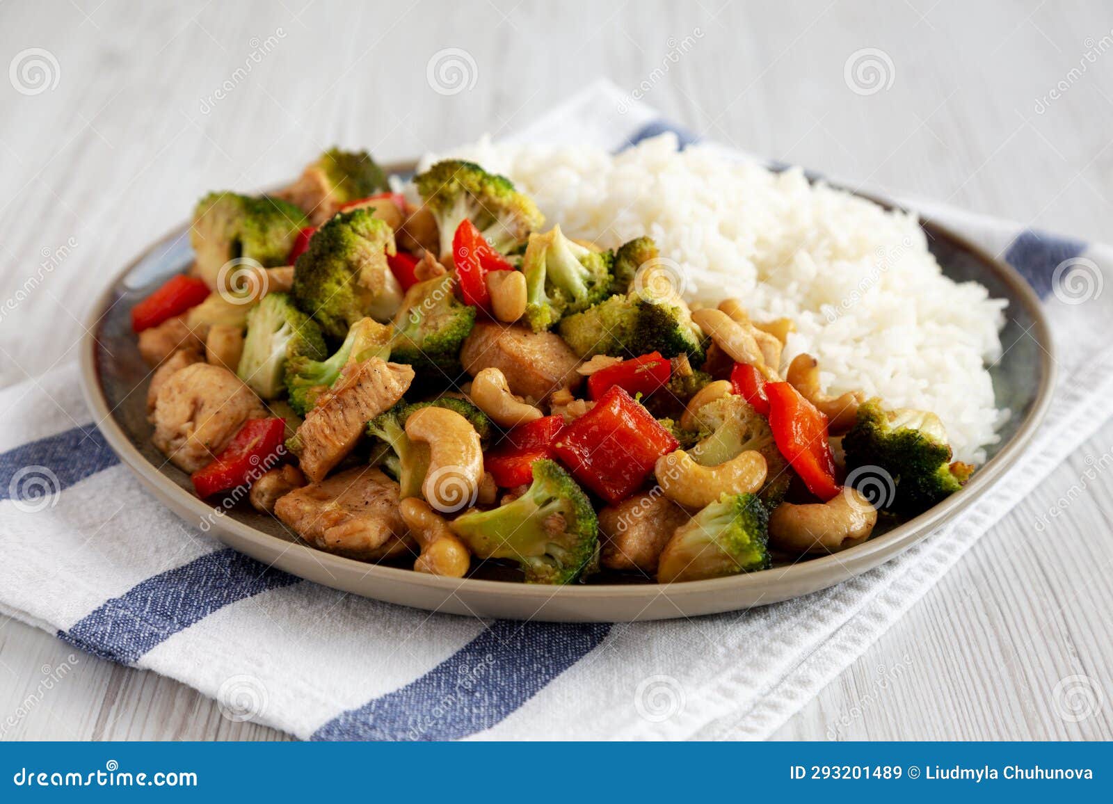 Homemade Cashew Chicken Stir-Fry on a Plate, Side View Stock Image