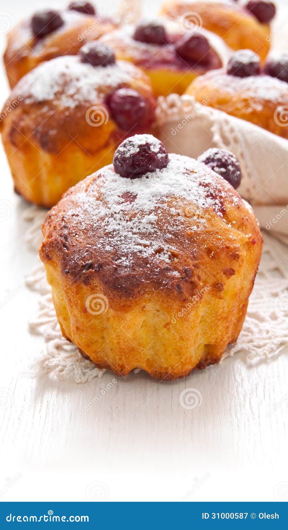 Homemade Cherry Muffins on the white background