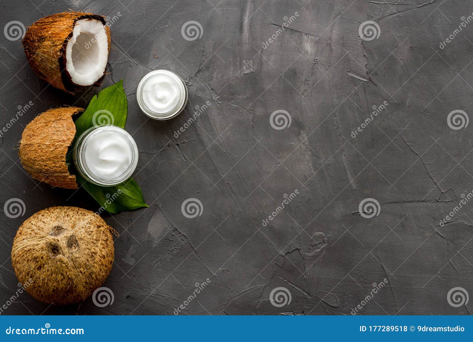 homemade coconut cream on grey background top-down frame copy space