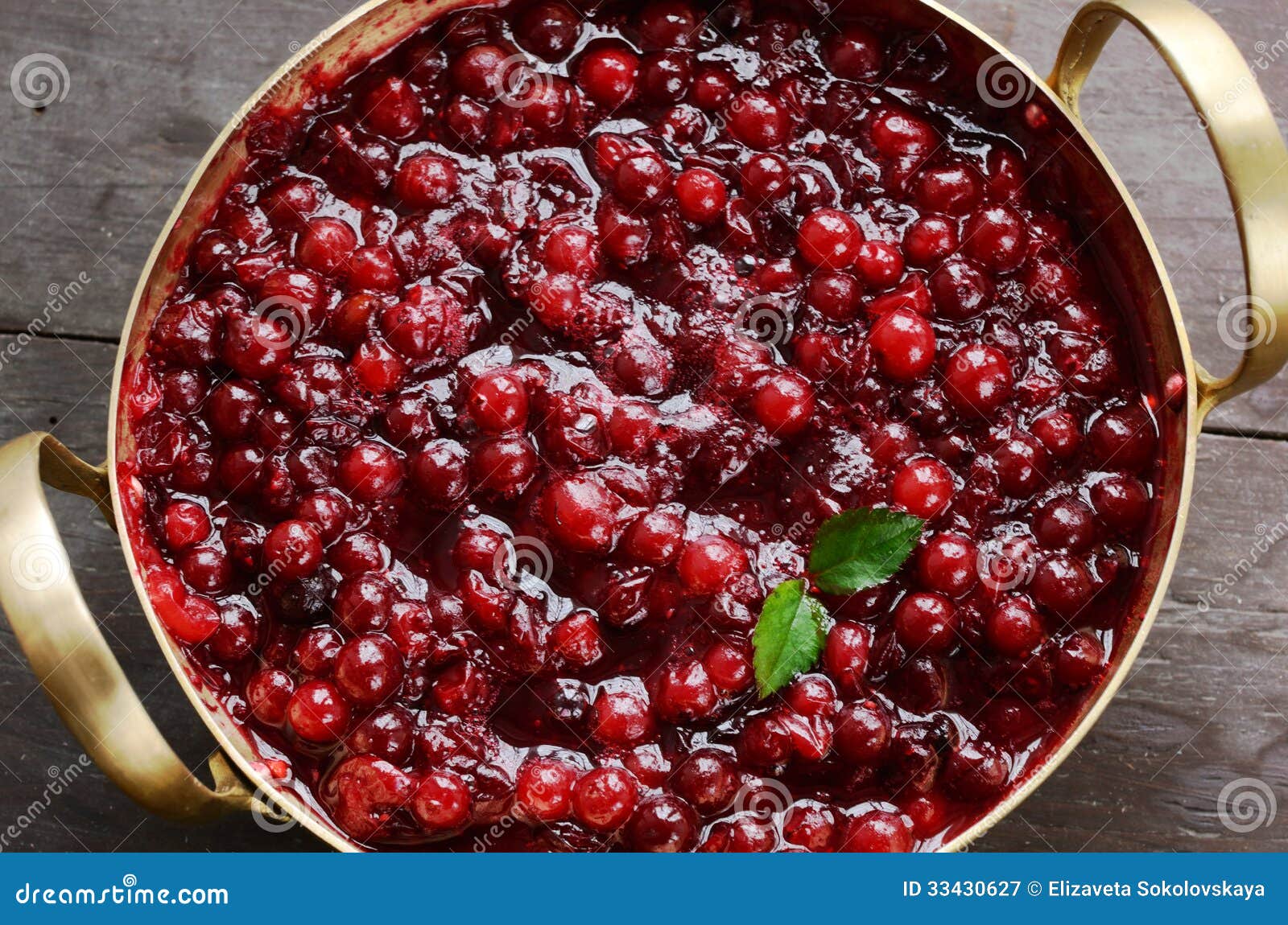 homemade cranberry jam in brass bowl