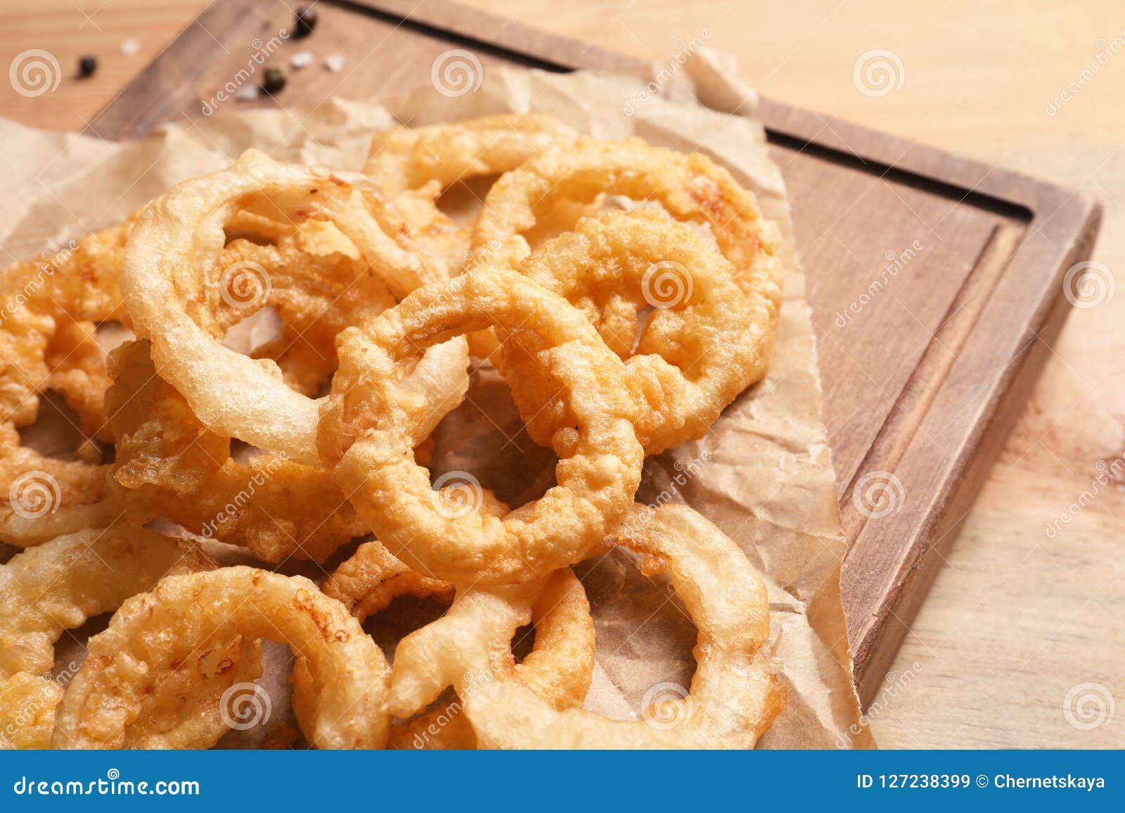 Homemade Crunchy Fried Onion Rings on Wooden Board Stock Image - Image ...