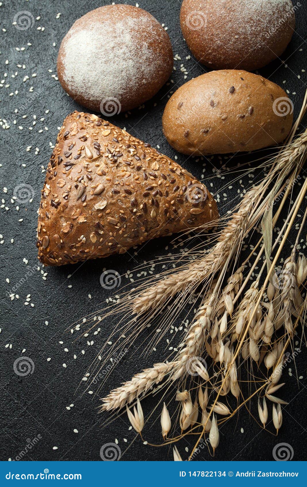 Homemade Different Types Of Bread On A Rustic Dark Background Stock