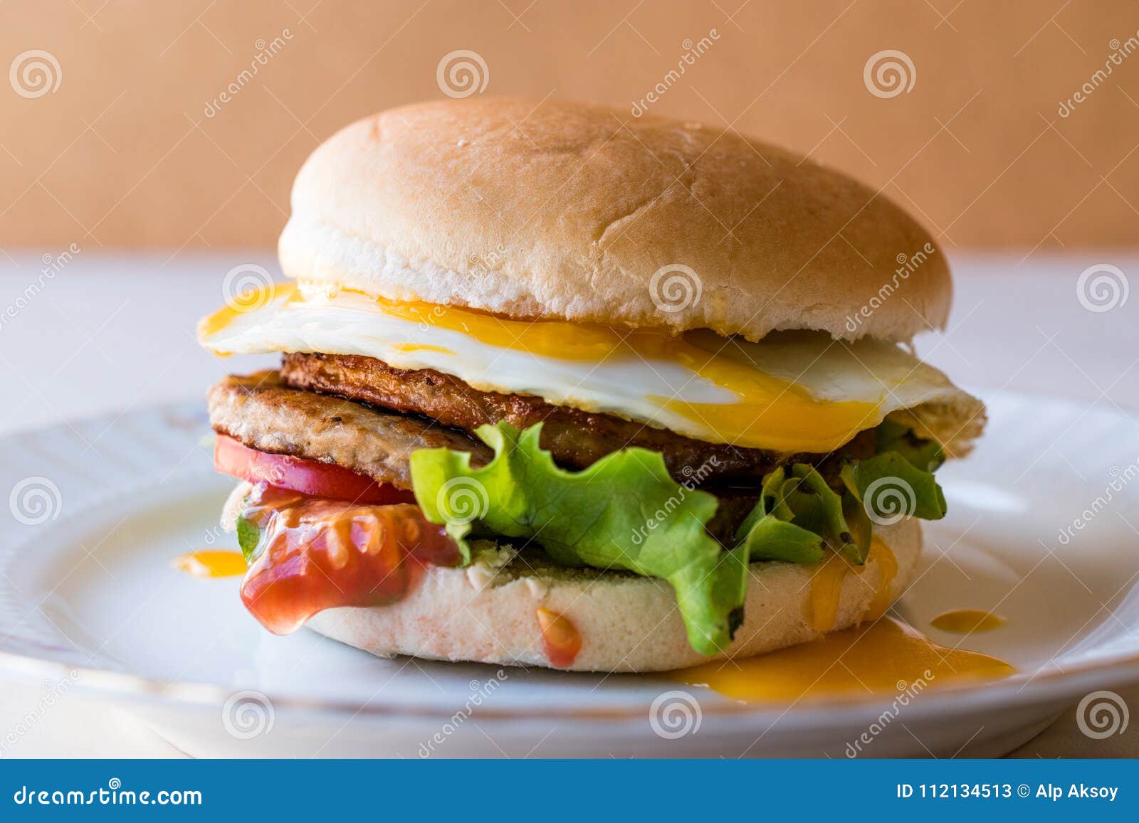 Homemade Double Hamburger with Egg, Lettuce and Tomatoes. Stock Image ...