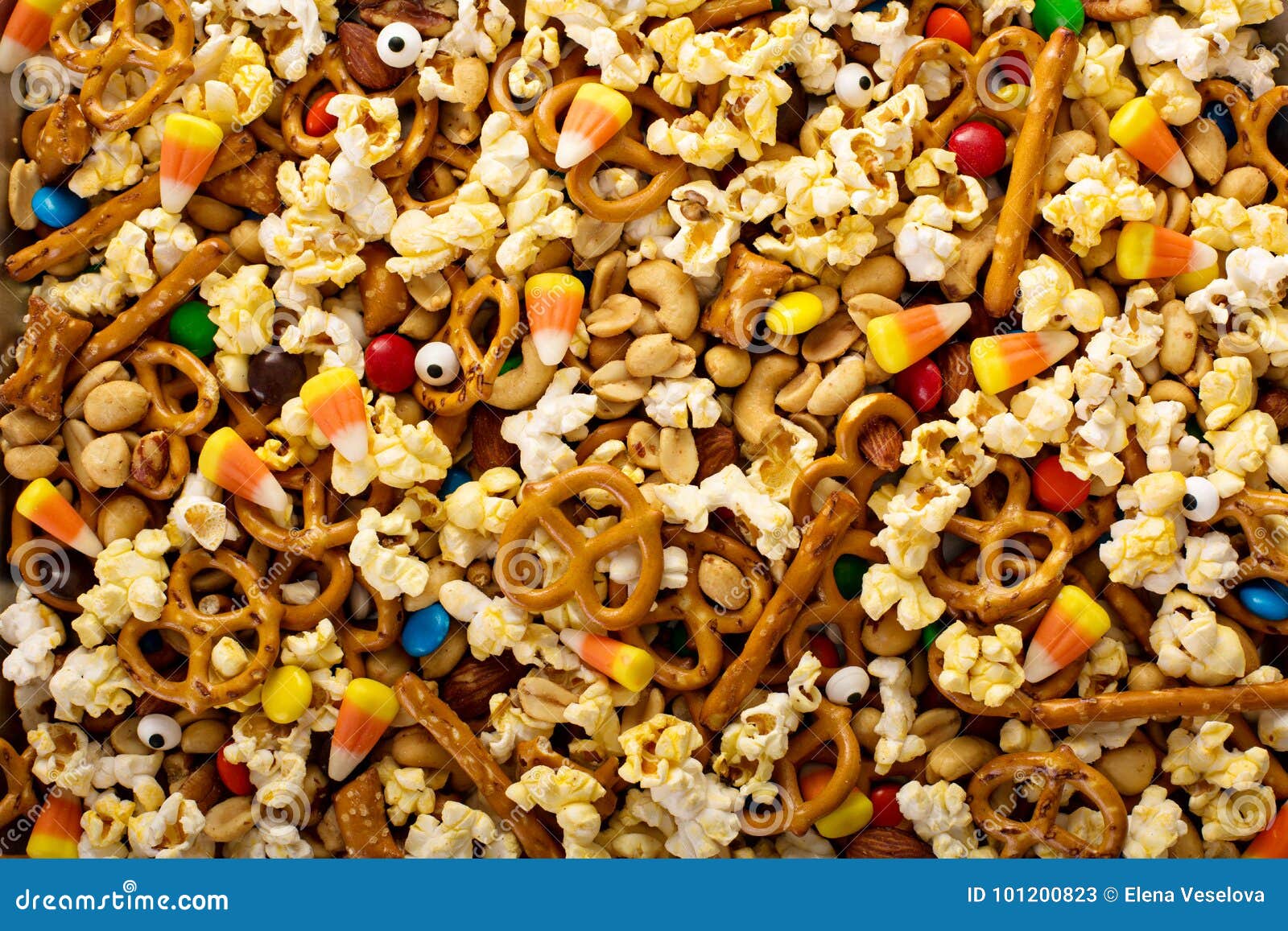 homemade halloween trail mix with popcorn, pretzels and nuts