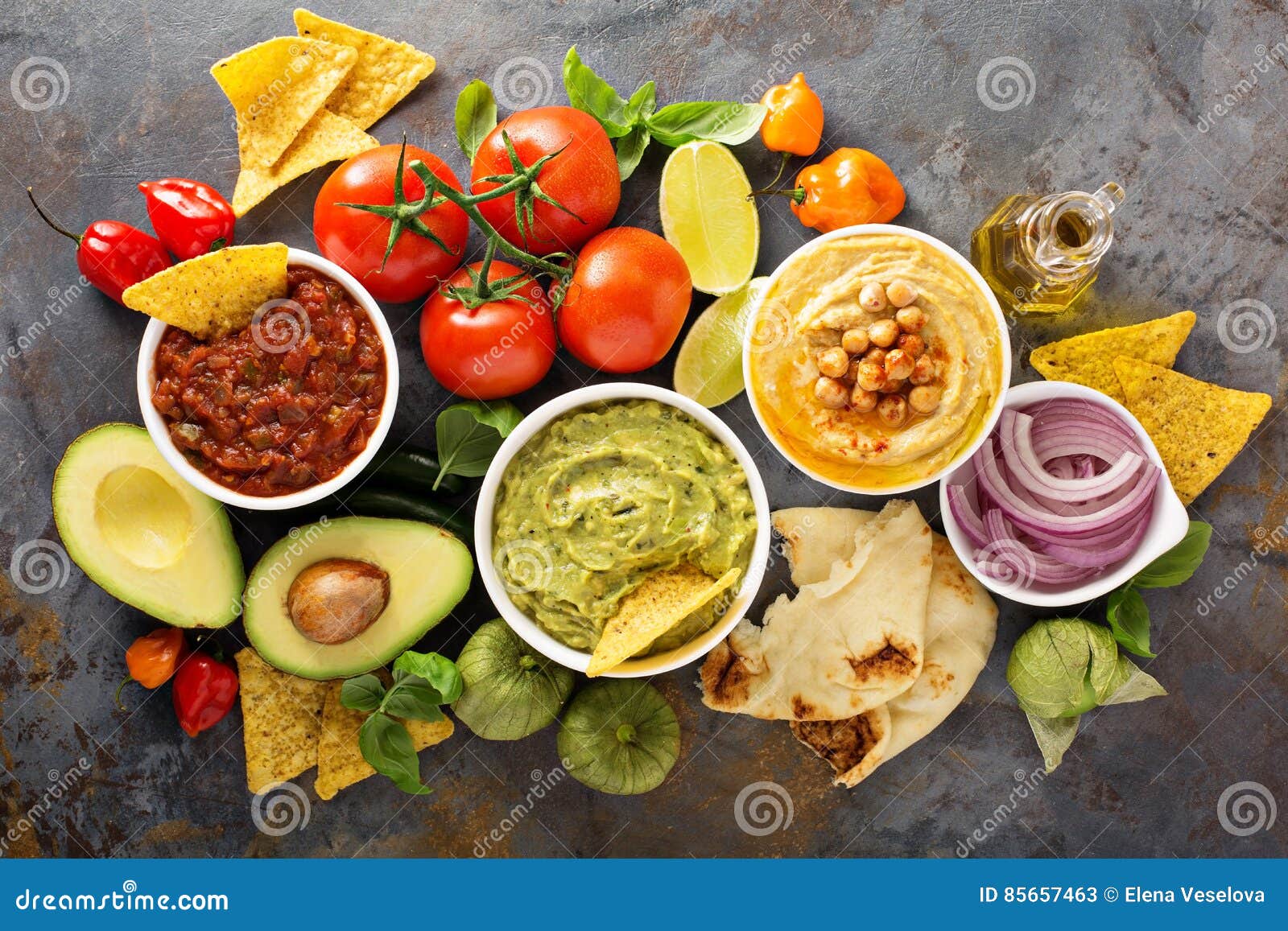 Homemade Hummus, Salsa and Guacamole with Corn Chips Stock Image