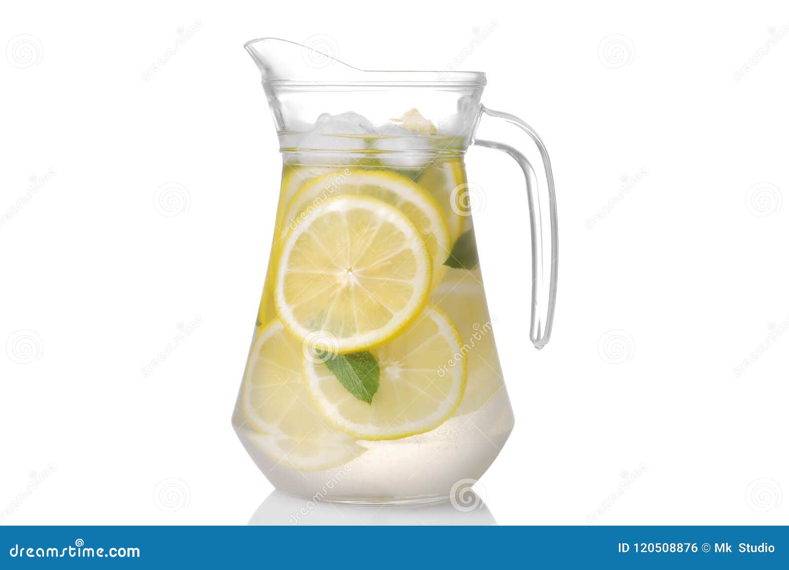 homemade lemonade with mint and ice with a glass jug . 