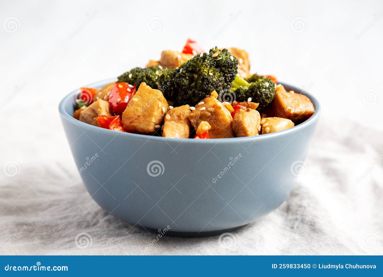 Homemade One-Pan Chicken and Broccoli Stir-Fry in a Bowl, Side View