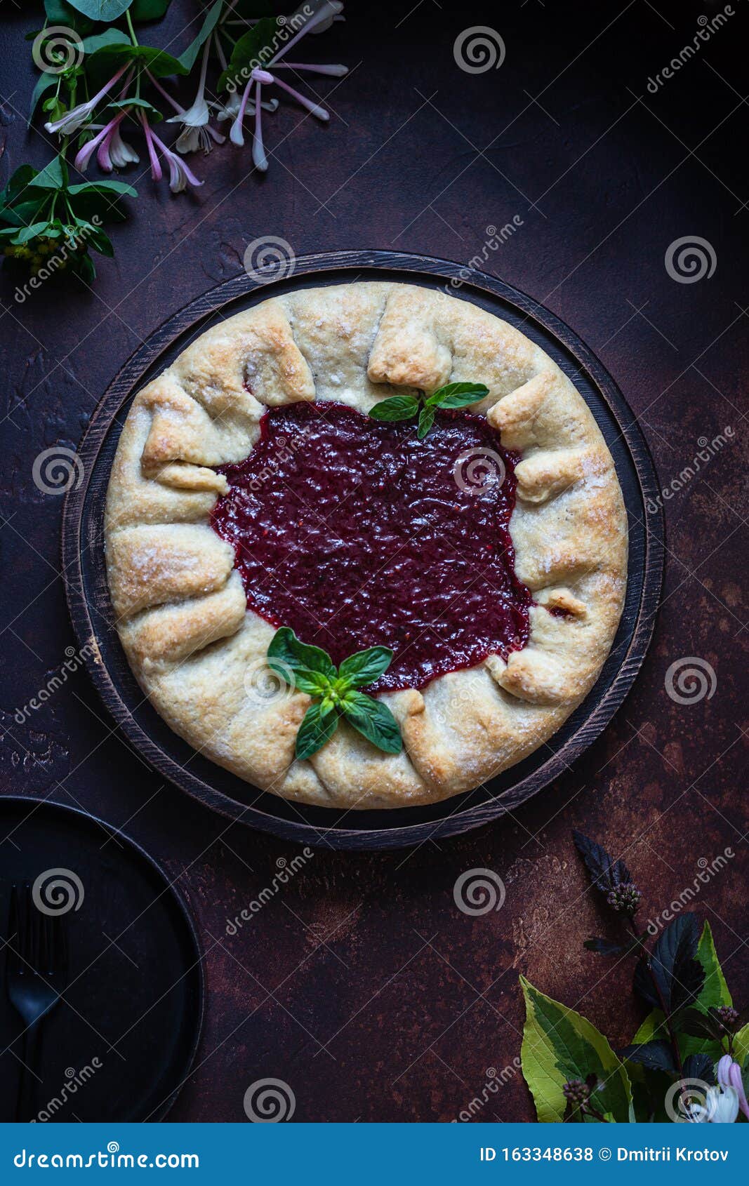 homemade open cake made of red currant shortcrust pastry, gallette