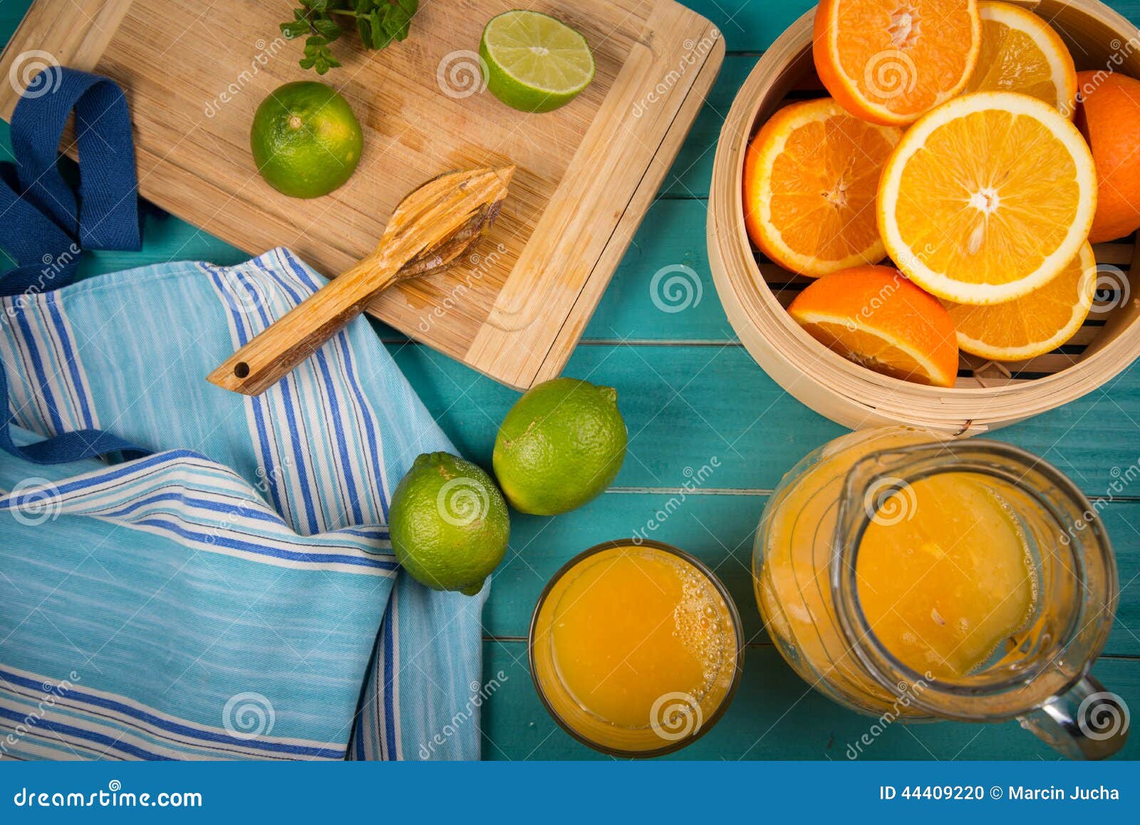 https://thumbs.dreamstime.com/z/homemade-orange-lemon-juice-fresh-organic-preparation-rustic-wooden-kitchen-table-vivid-colour-blue-background-44409220.jpg