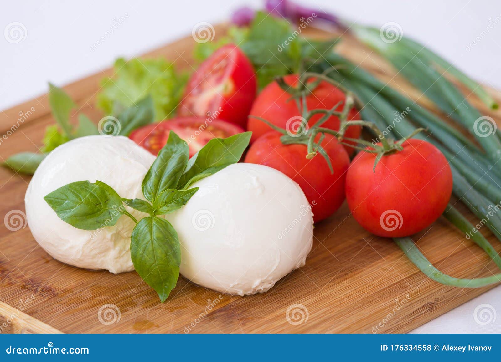 Homemade Organic Mozzarella Cheese with Tomato and Basil and Onions