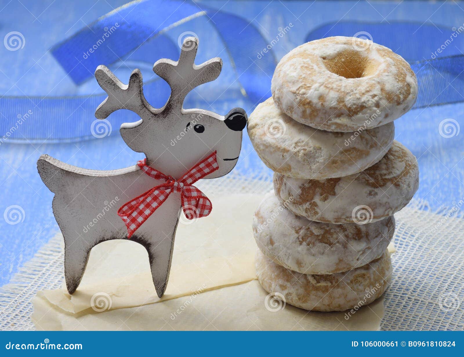 Funny Wooden deer sniffing the handmade Christmas cakes Joke Christmas New Year Homemade baking Holiday humor