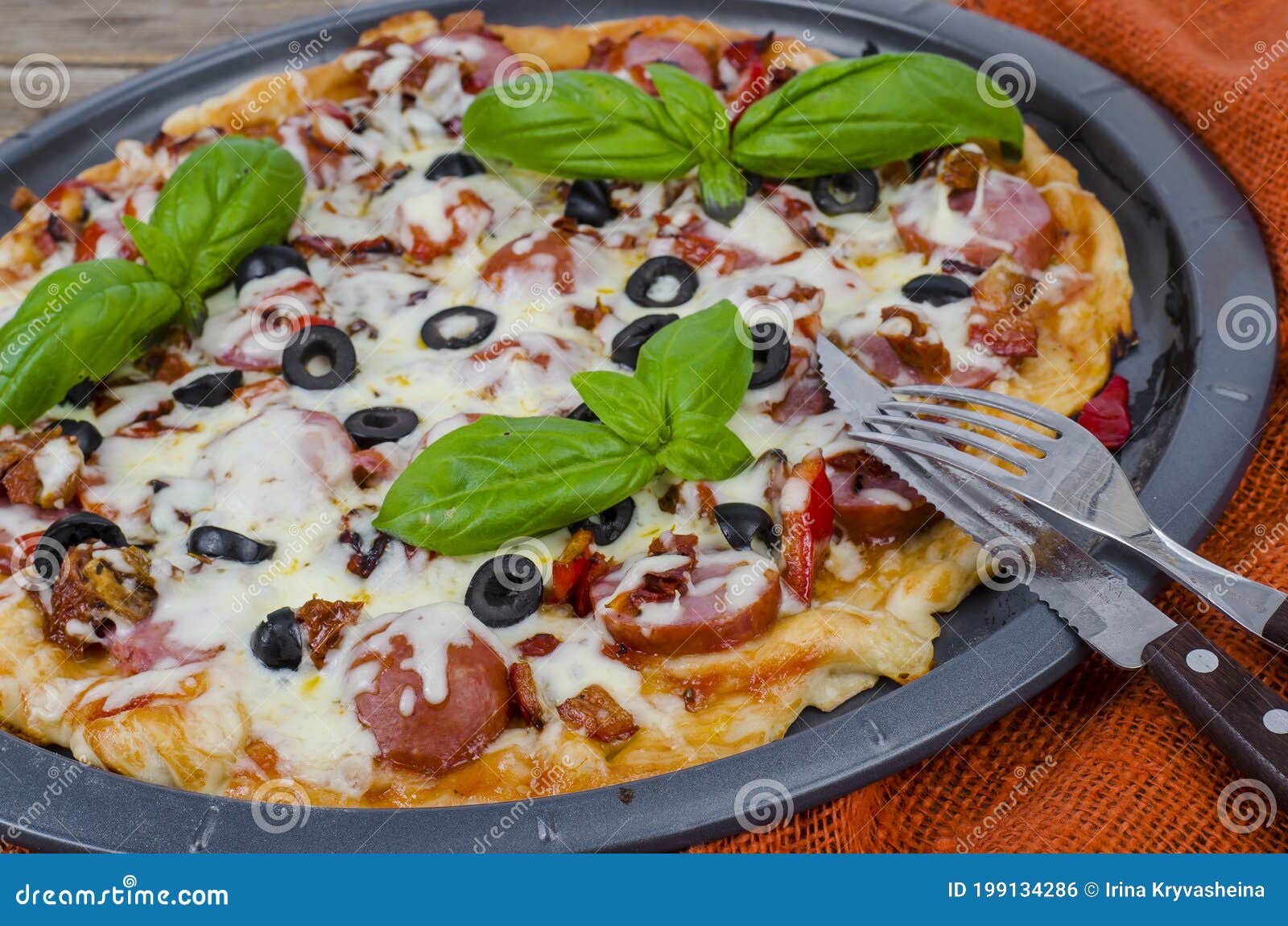 Homemade Pizza With Salami Mozzarella And Olives Stock Photo Image