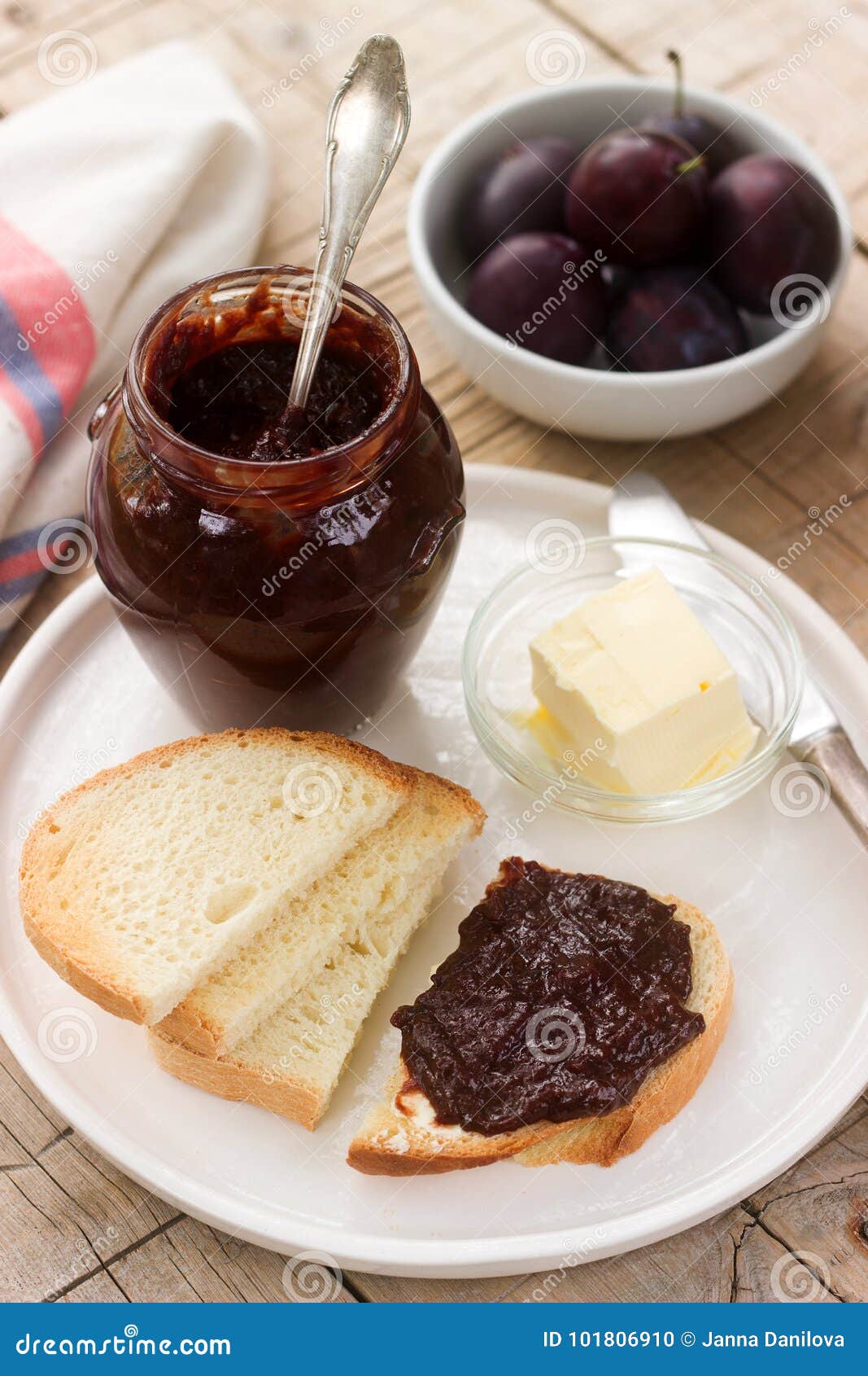 homemade plum jam with chocolate. toasts with jam. rustic style, selective focus.