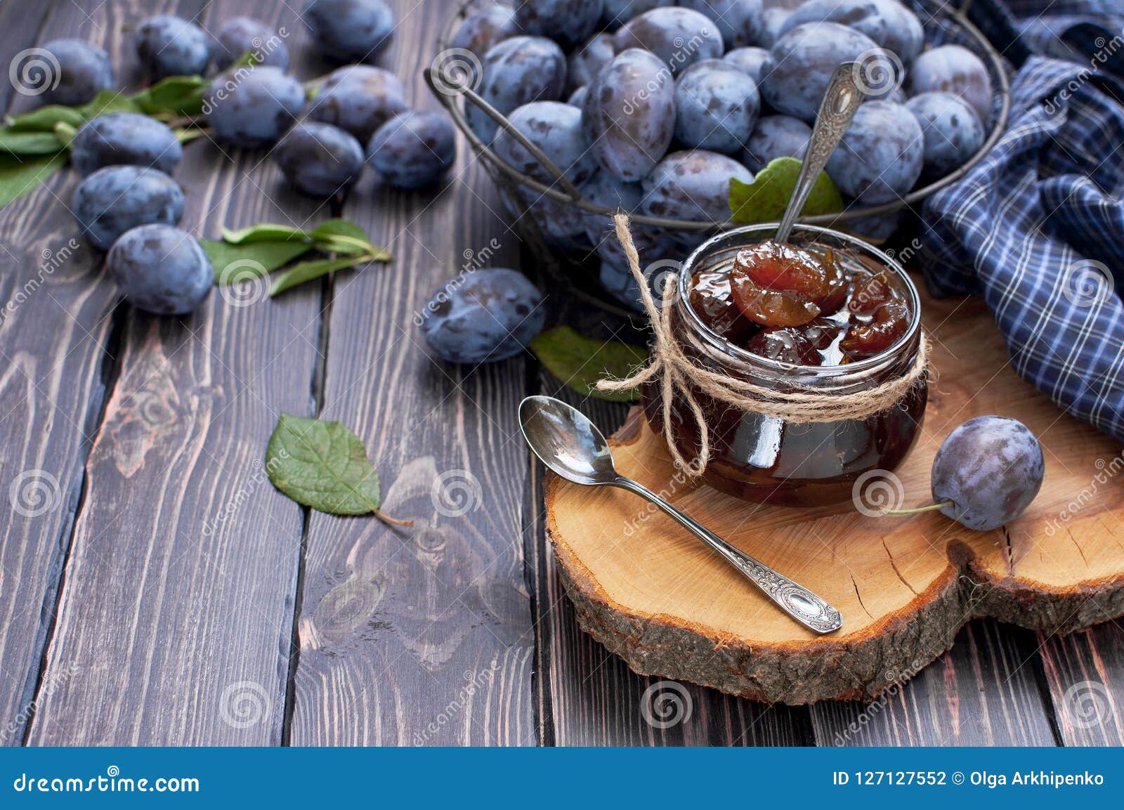 Homemade Plum Jam In A Glass Jar And Fresh Blue Plums In A ...