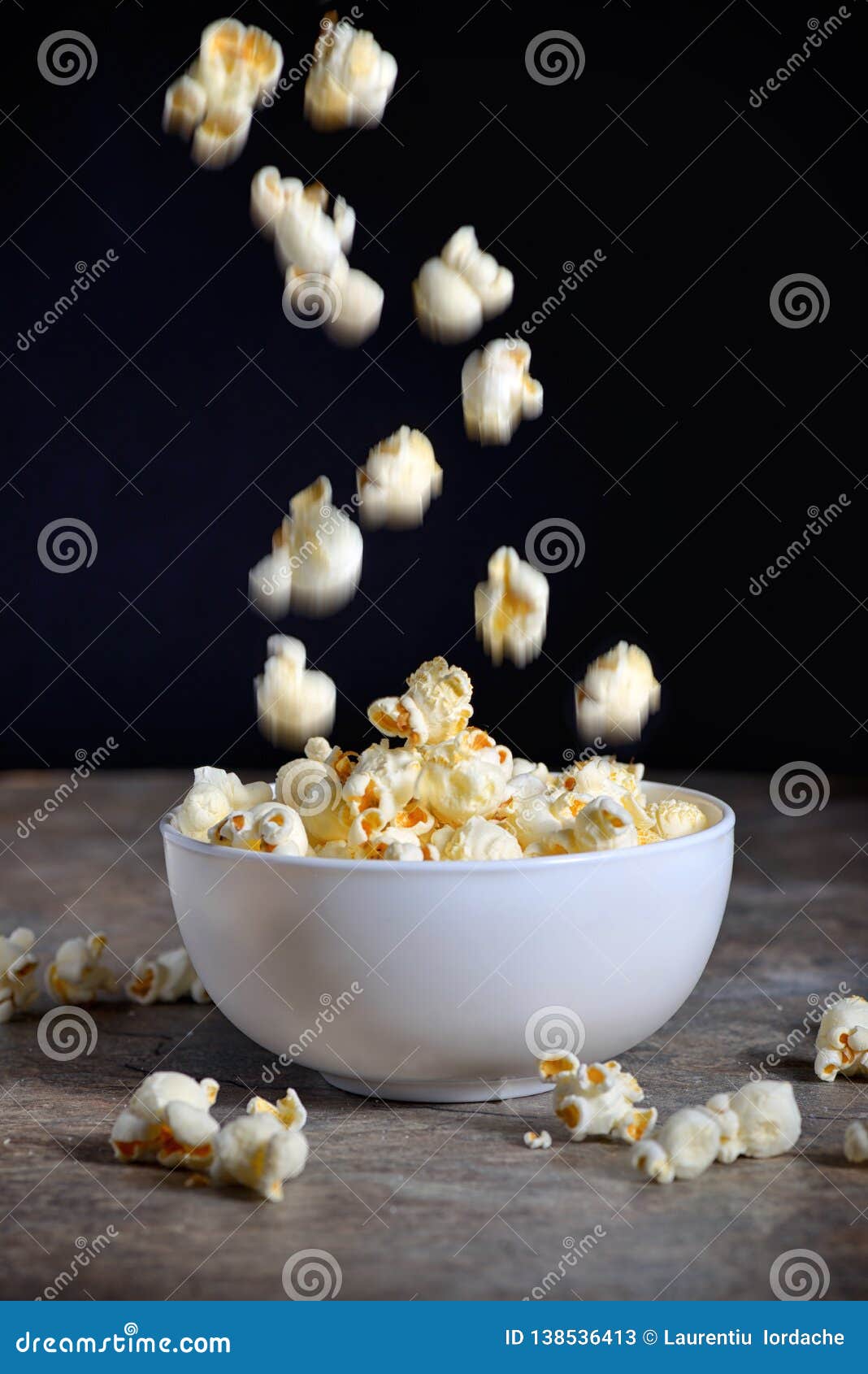 Homemade Popcorn on table stock image. Image of drop 138536413