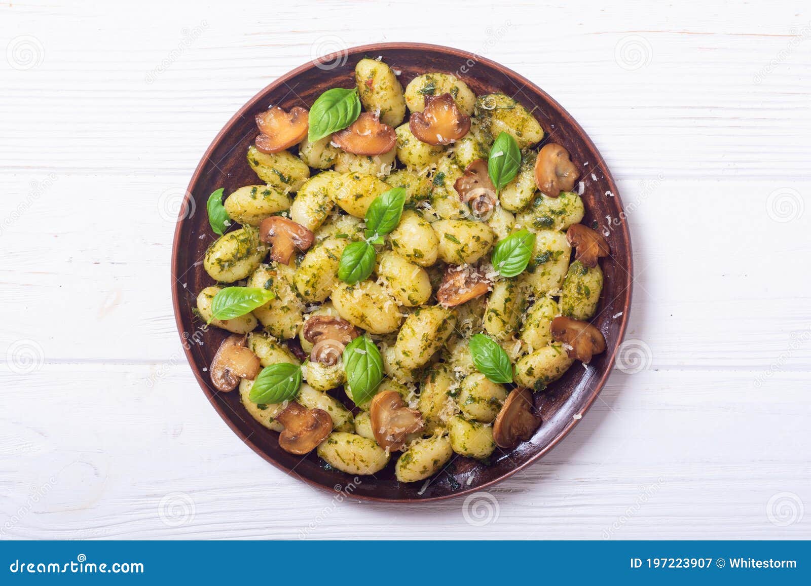 Homemade Potatoes Gnocchi with Basil , Cheese and Mushrooms Stock Image ...