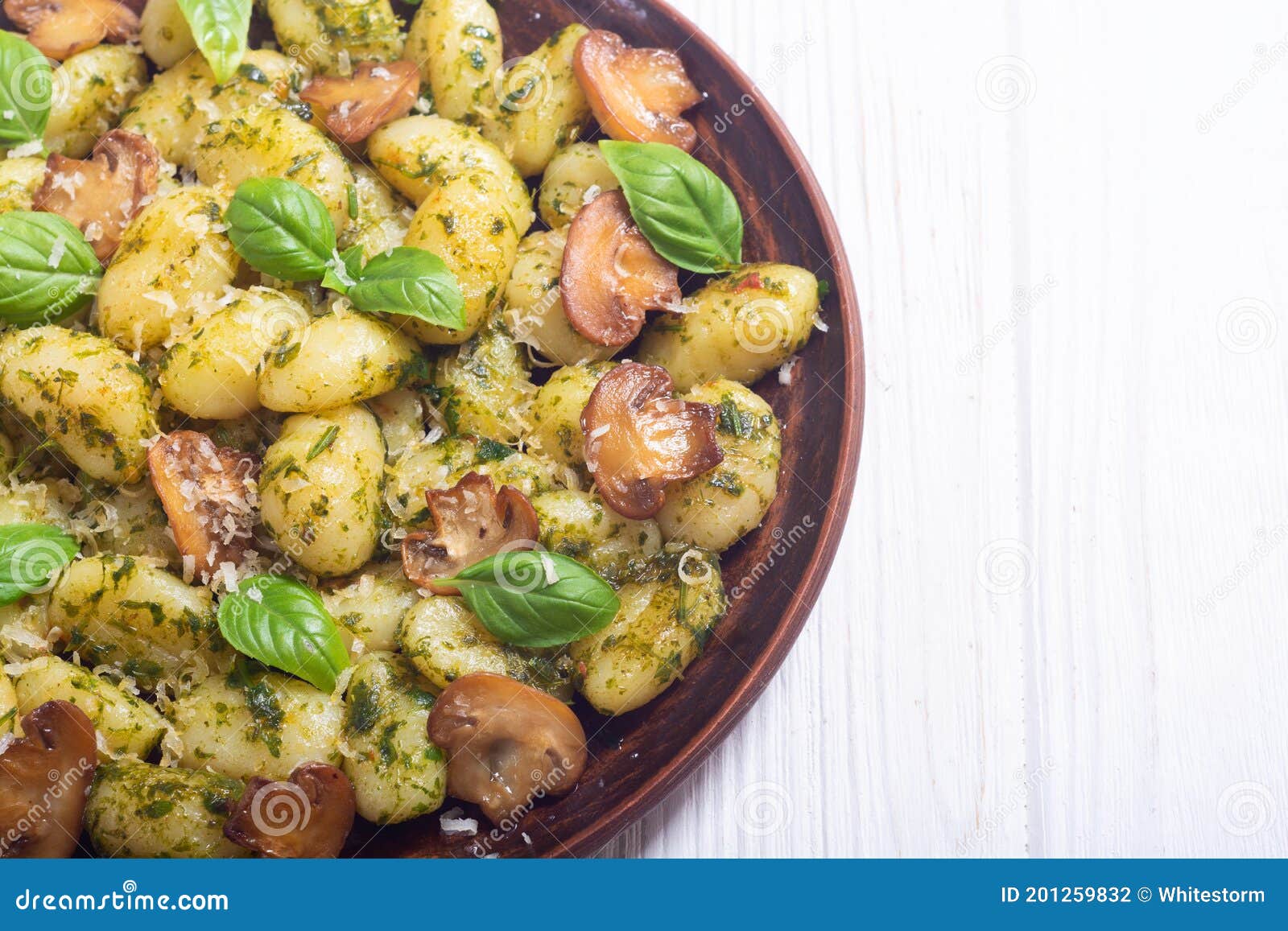Homemade Potatoes Gnocchi with Basil , Cheese and Mushrooms Stock Photo ...