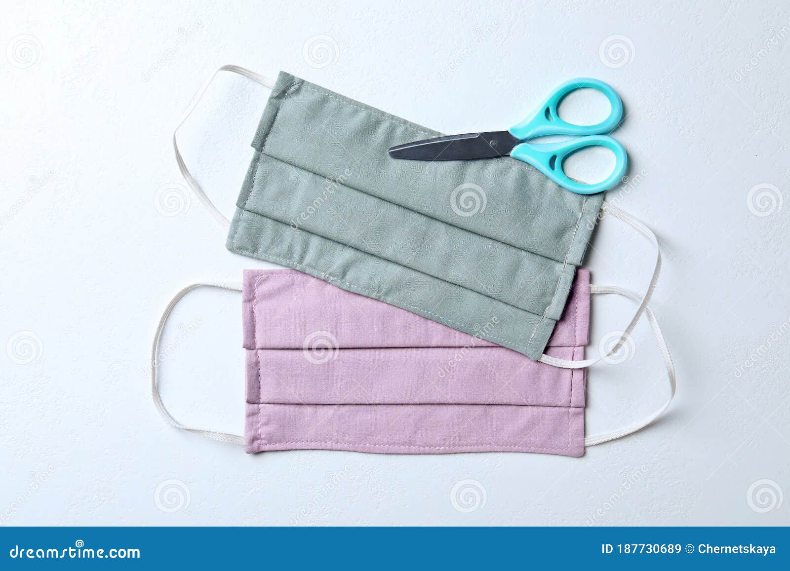 Homemade Protective Masks and Scissors on Background, Flat Lay. Sewing ...