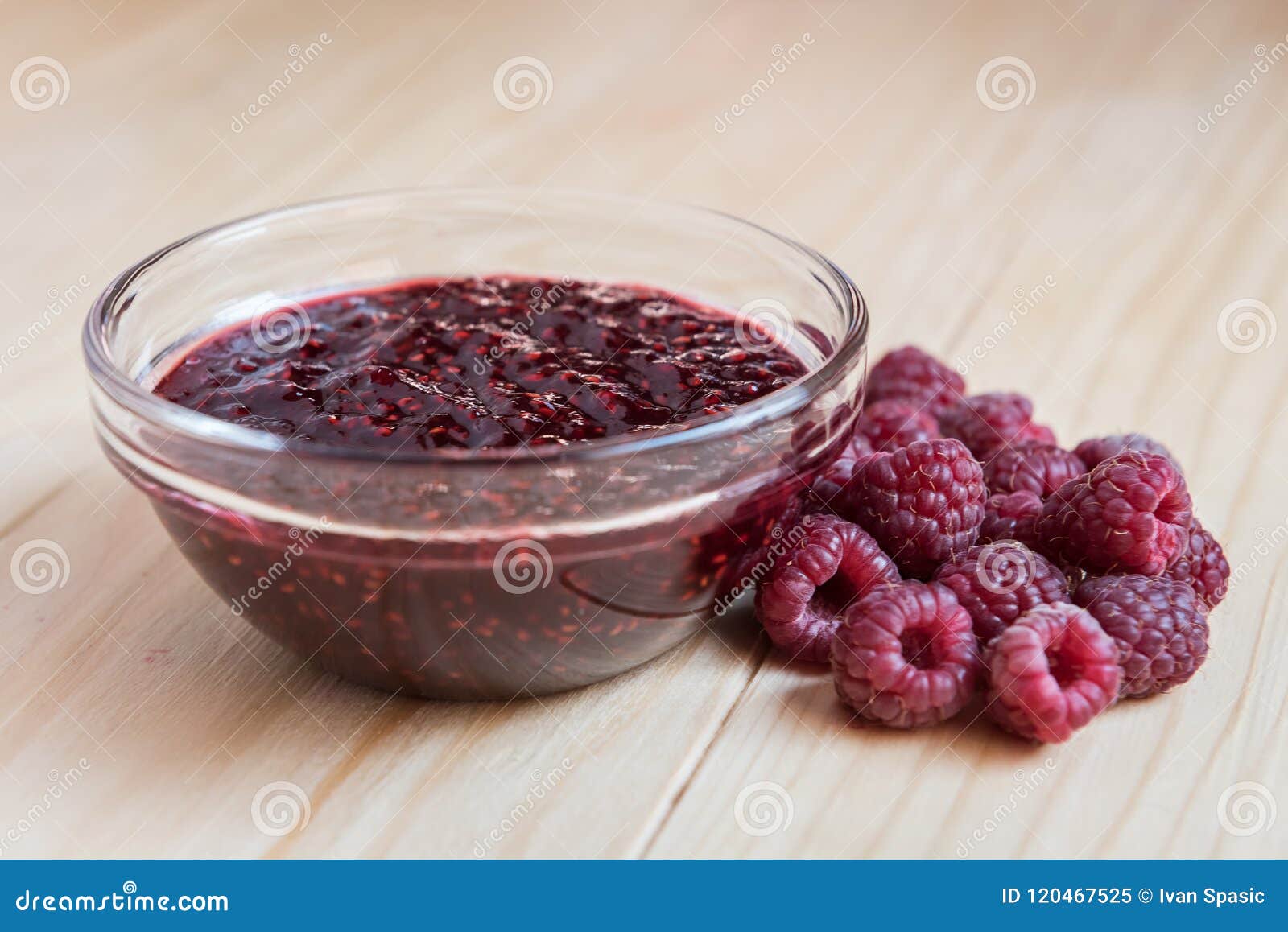 homemade raspberry jam with fresh ripe organic raspberries
