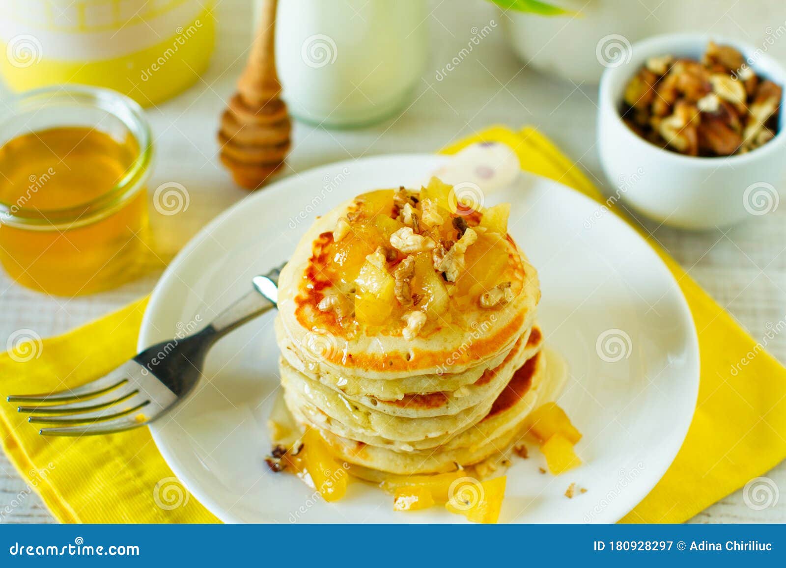 Homemade Rustic Pancakes Stack with Baked Apples and Walnuts Stock