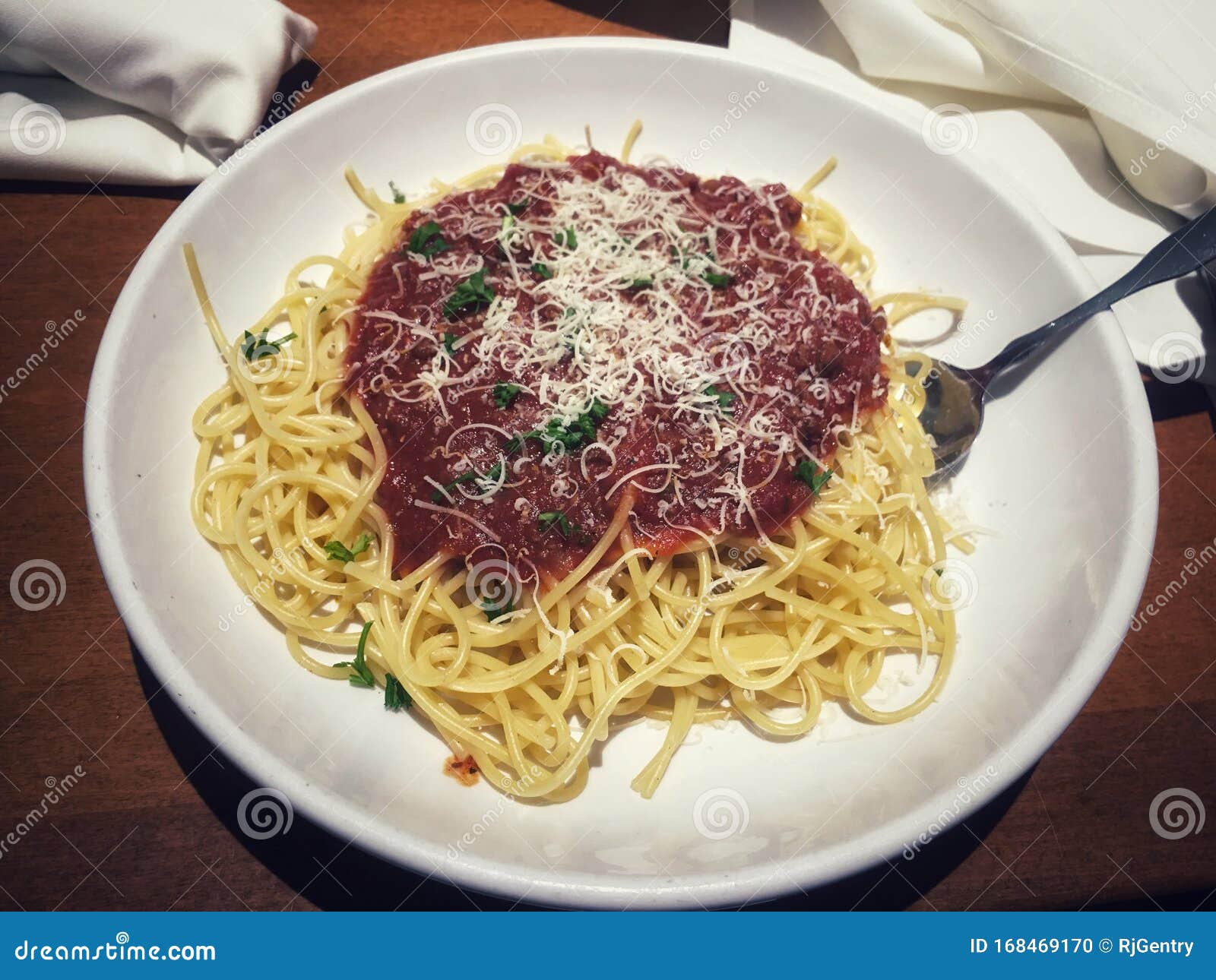 Homemade Spaghetti with Marinara Sauce on a White Dinner Plate Stock