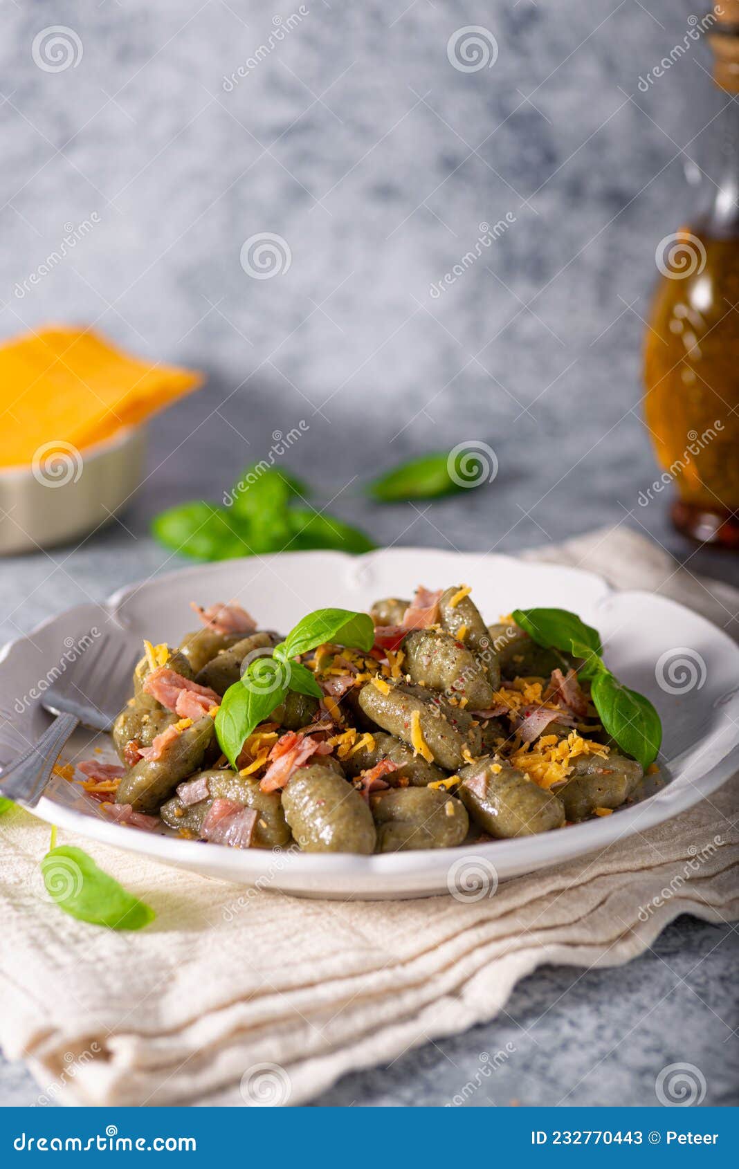 Spinach gnocchi with ham stock image. Image of gourmet 232770443