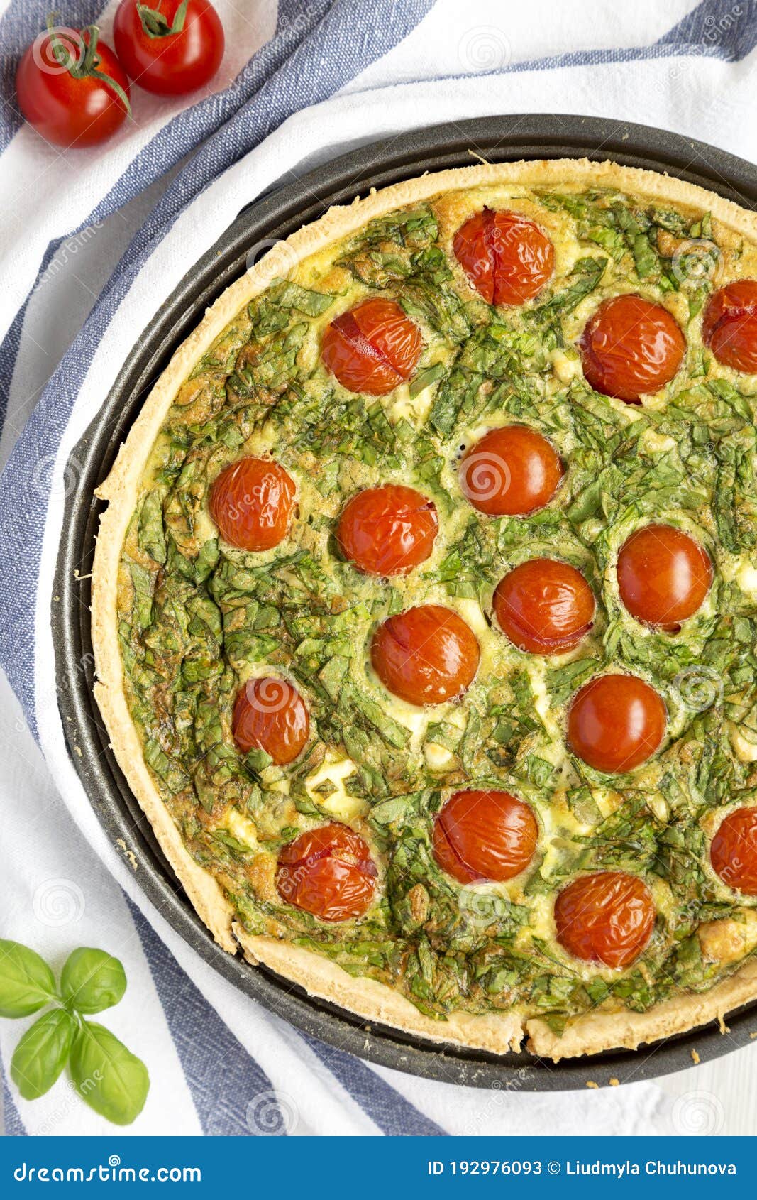 Homemade Spinach Quiche in a Baking Dish, Top View. Flat Lay, Overhead