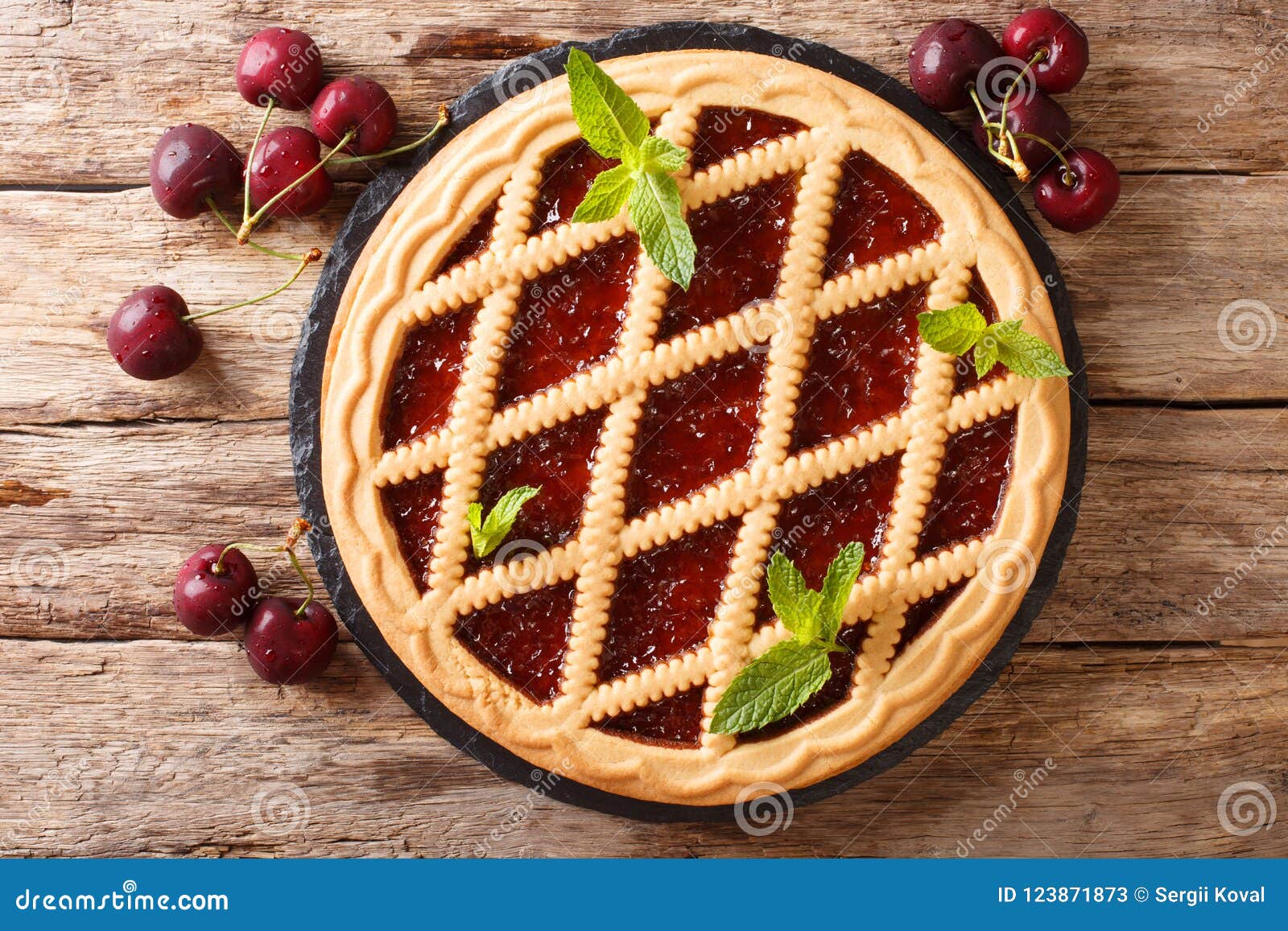 homemade summer pastries cherry pie crostata close-up. horizontal top view