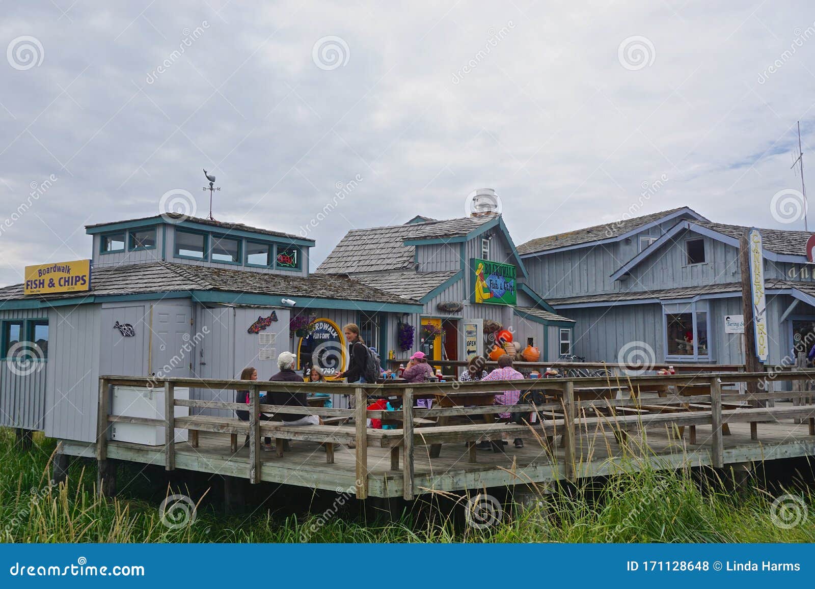 Homer, Alaska: Guests Enjoying an Afternoon on the Patio at Boardwalk
