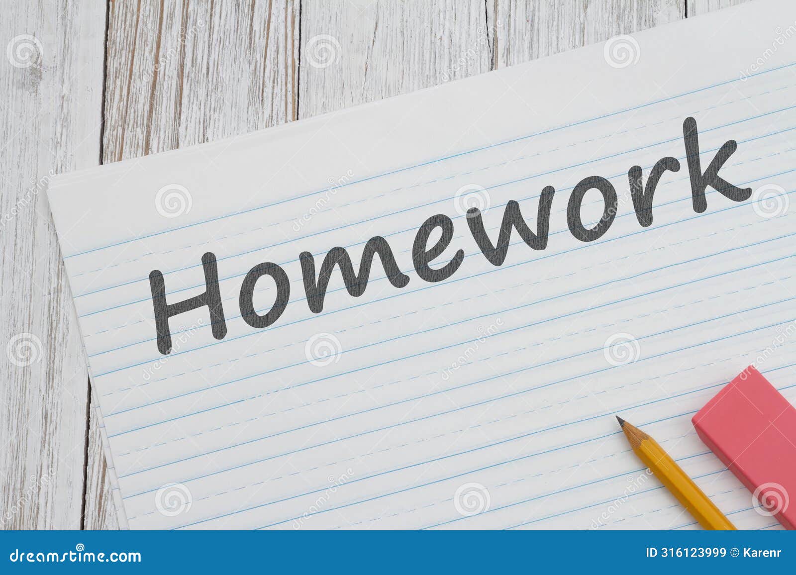 homework message on ruled lined paper with pencil for school